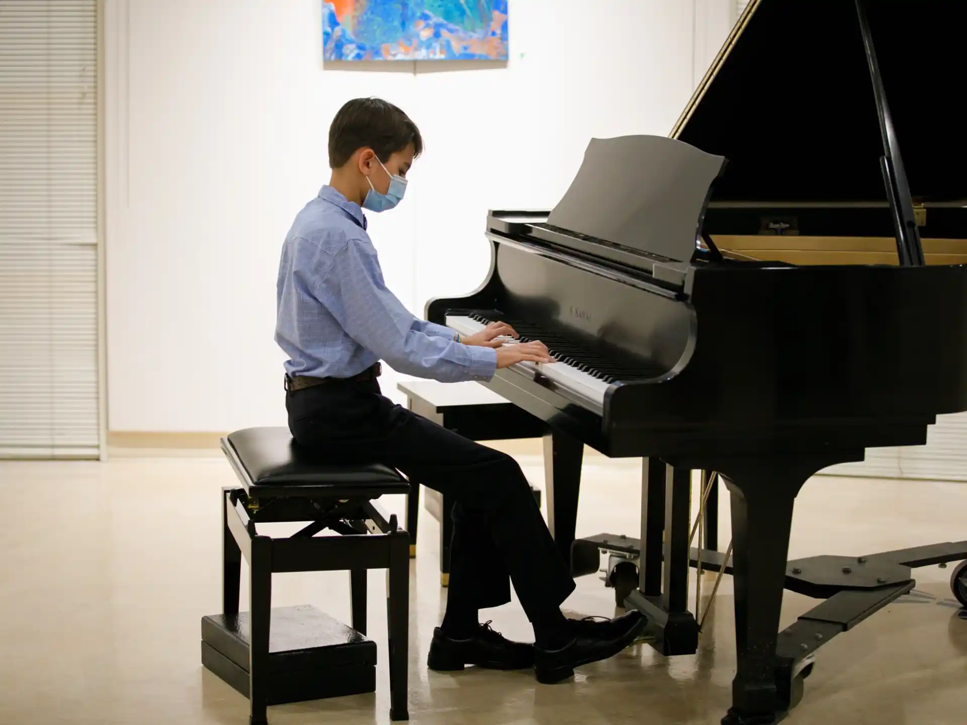 a man playing a piano