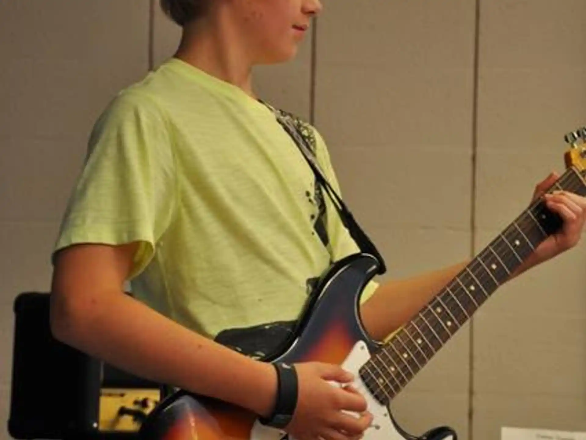 a person playing a guitar