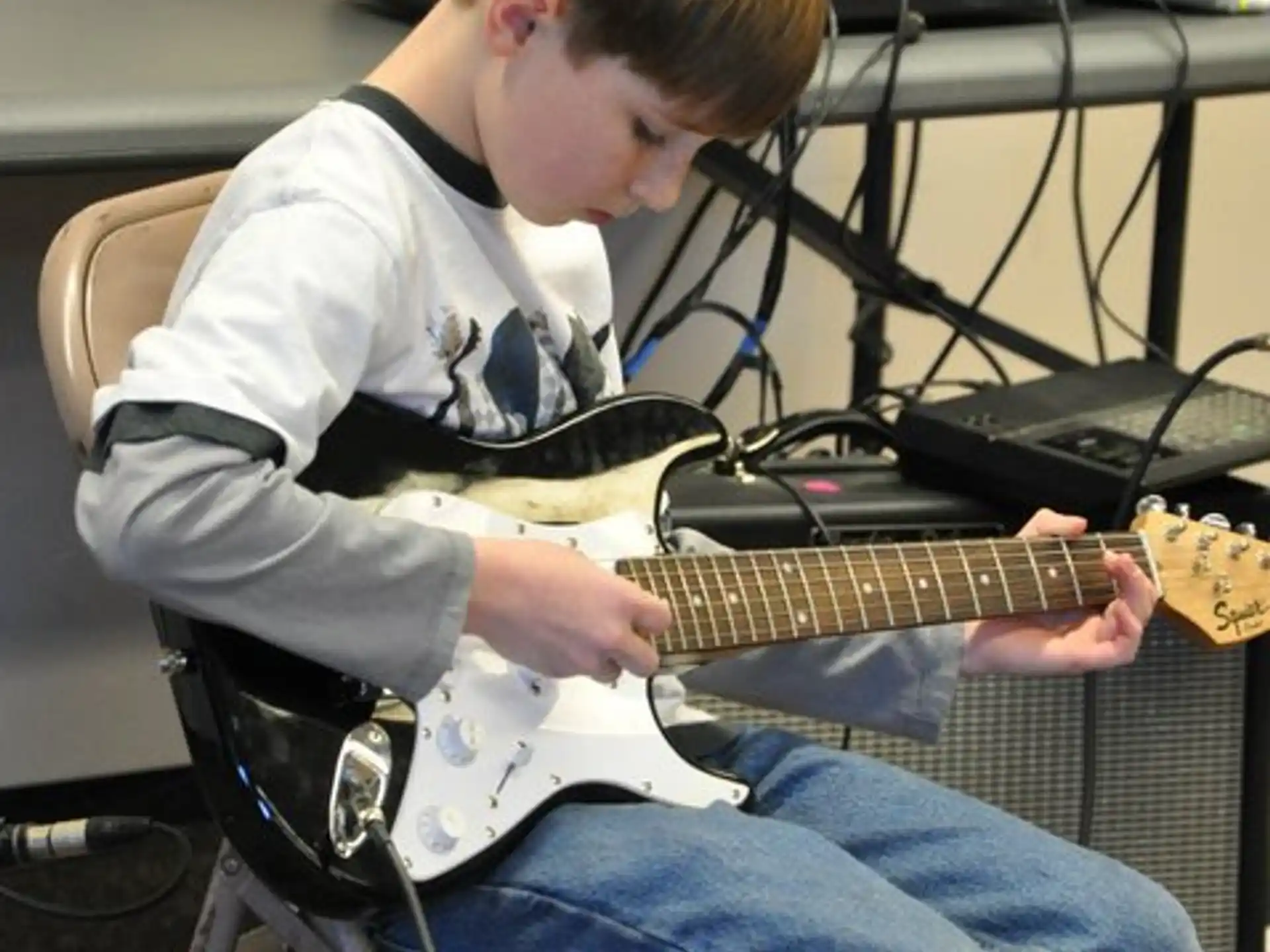 a person playing a guitar