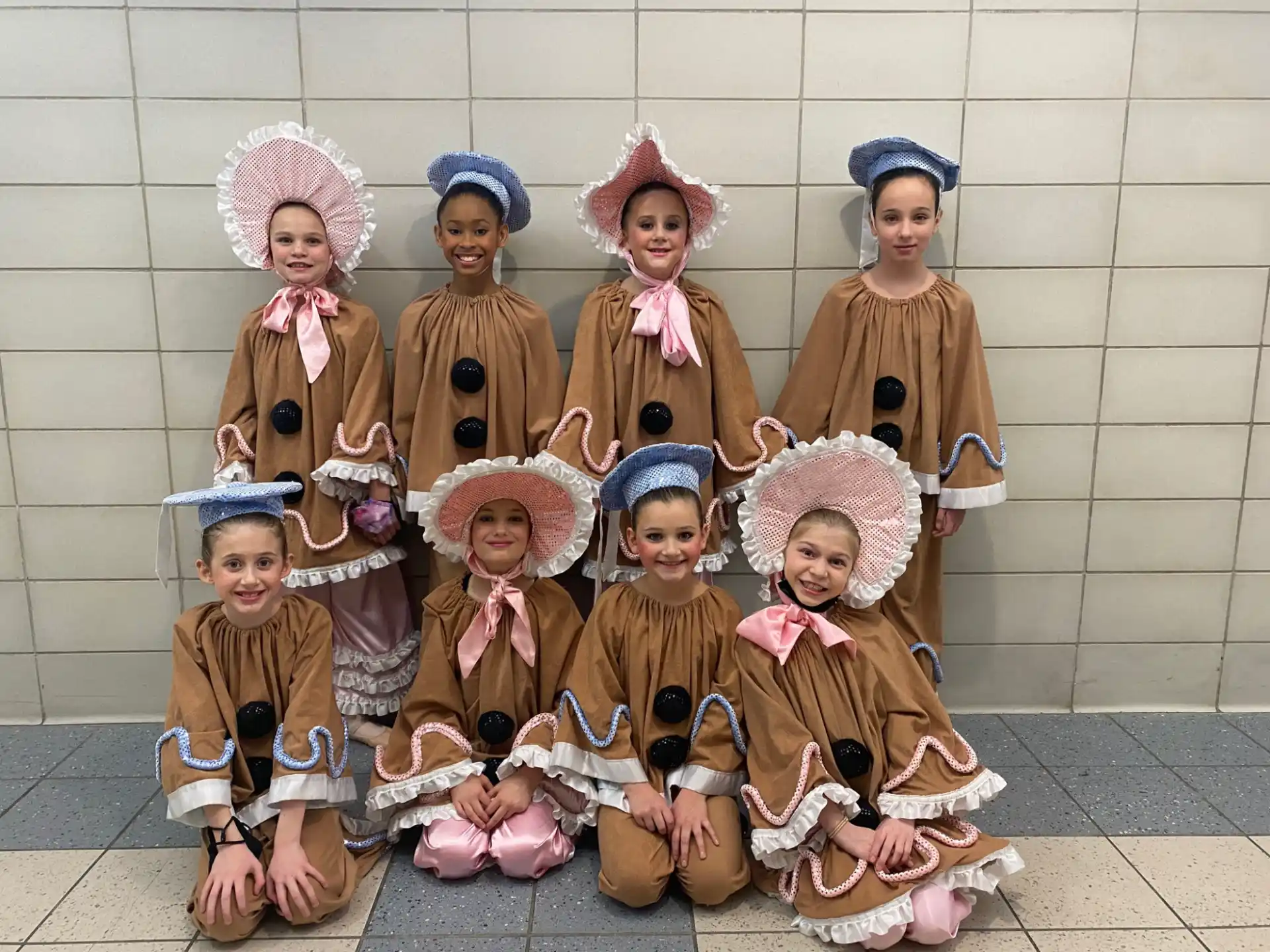 a group of children in clothing
