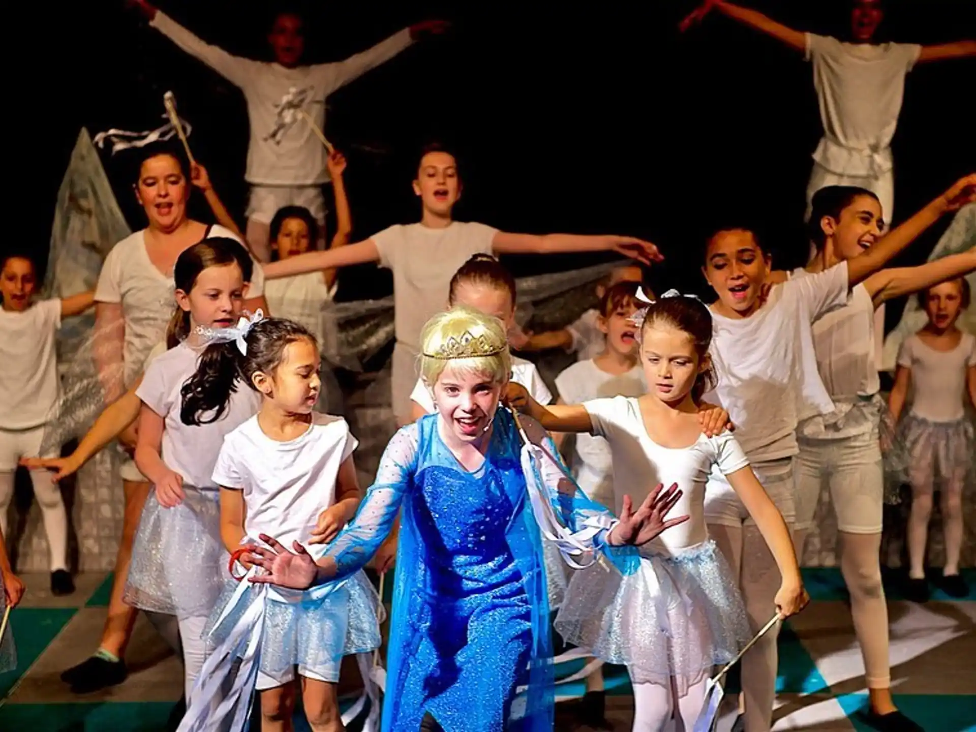 a group of children dancing