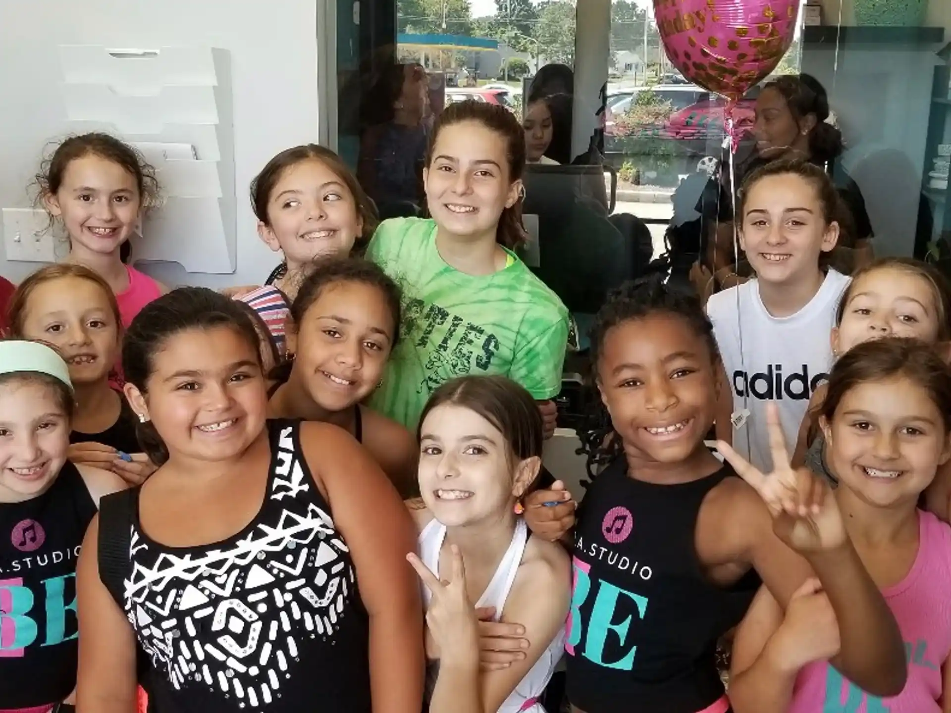 a group of children posing for a photo