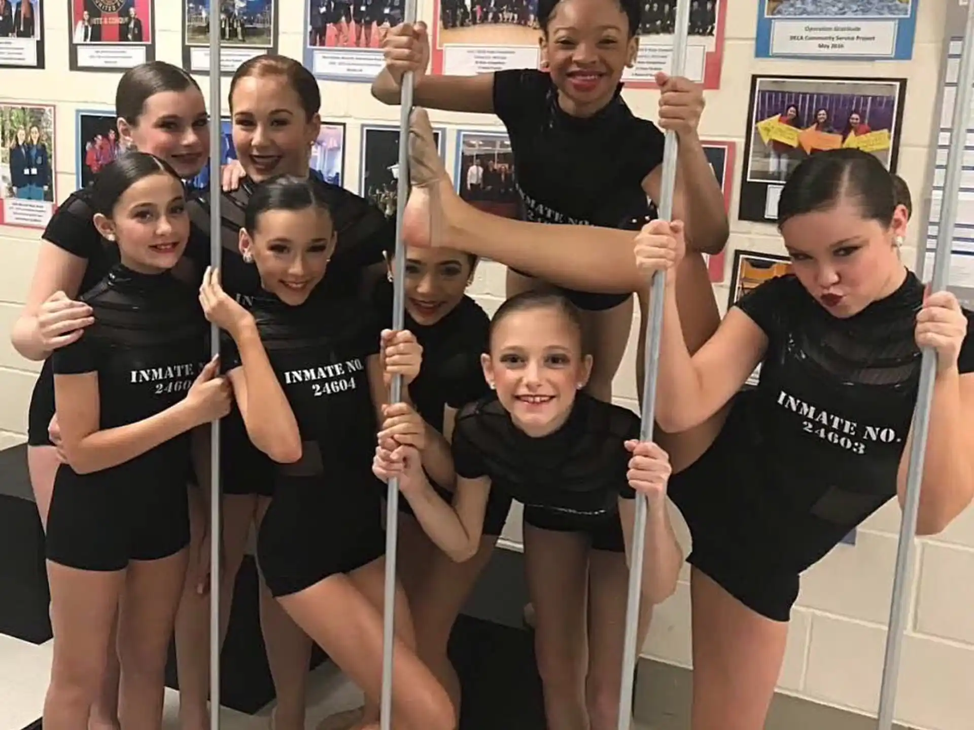 a group of girls posing for a photo