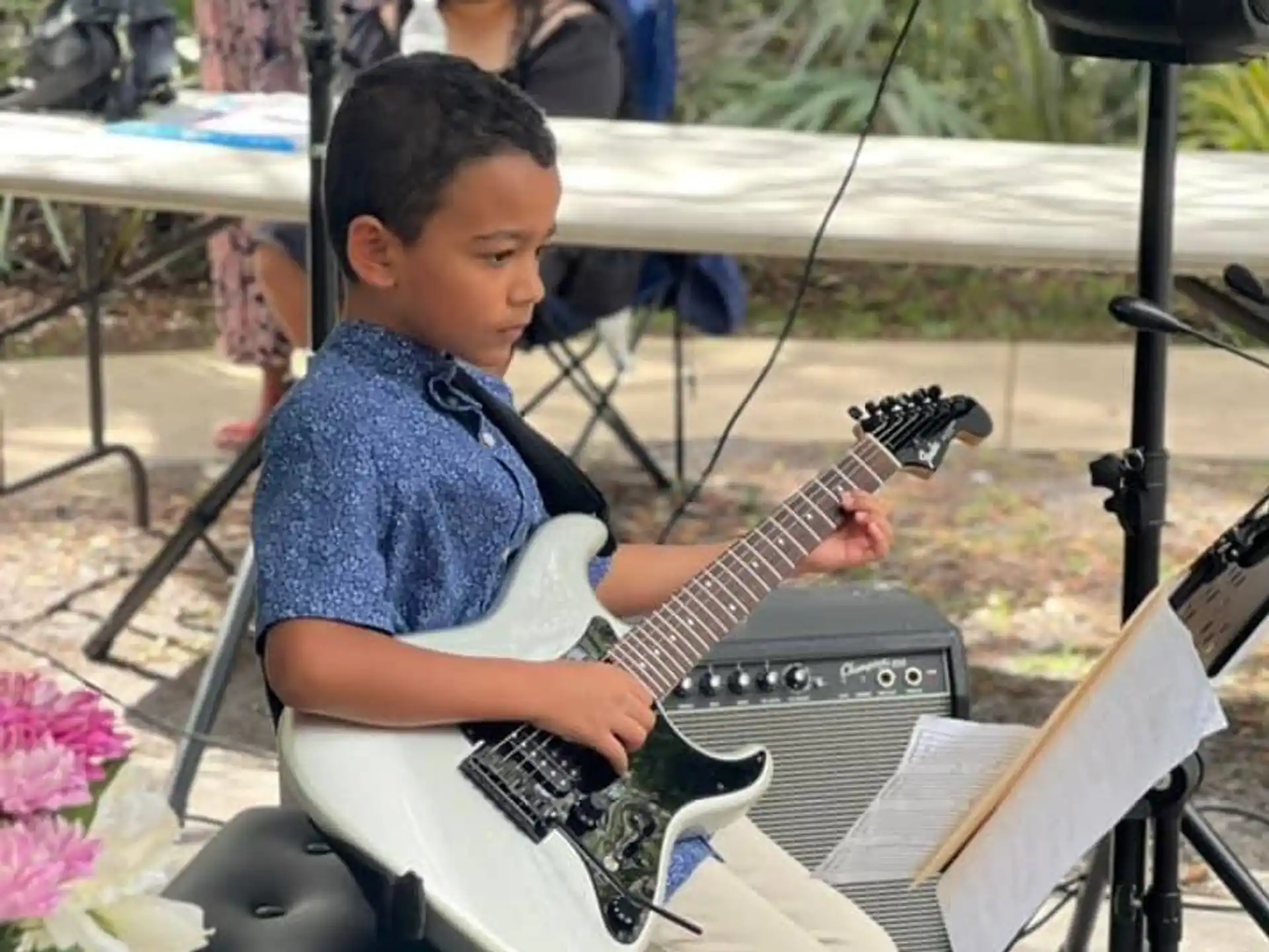 a boy playing an instrument