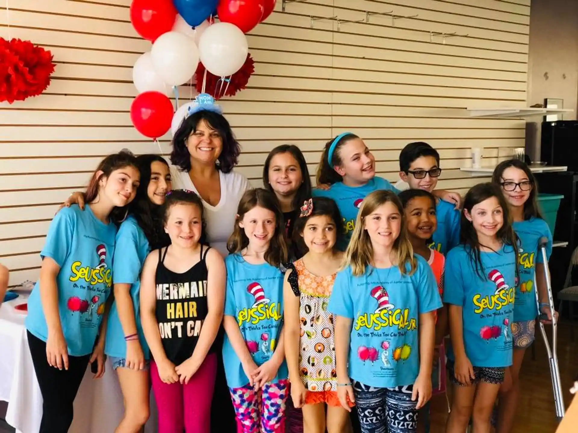 a group of people posing for a photo