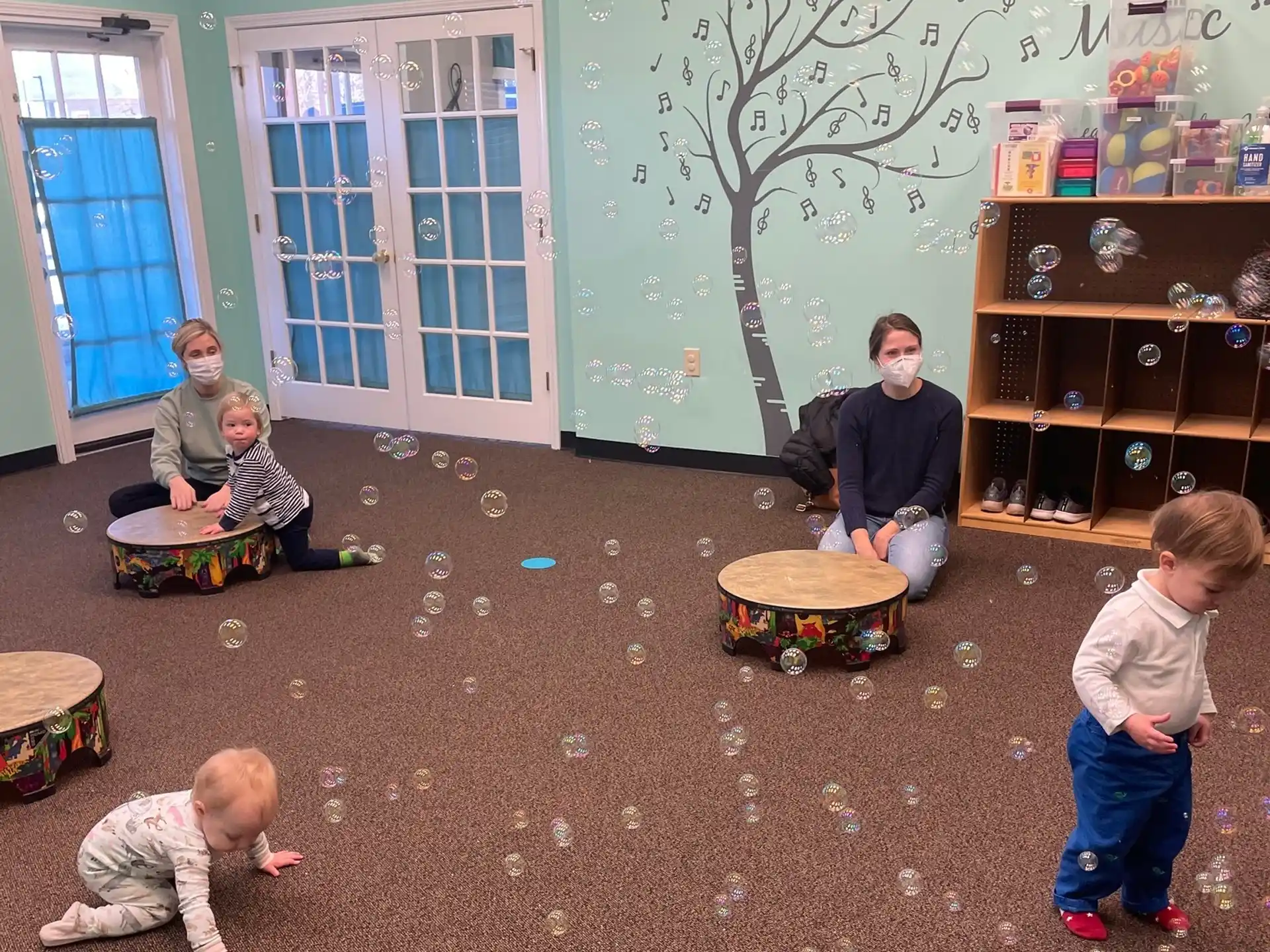 a group of children playing with toys