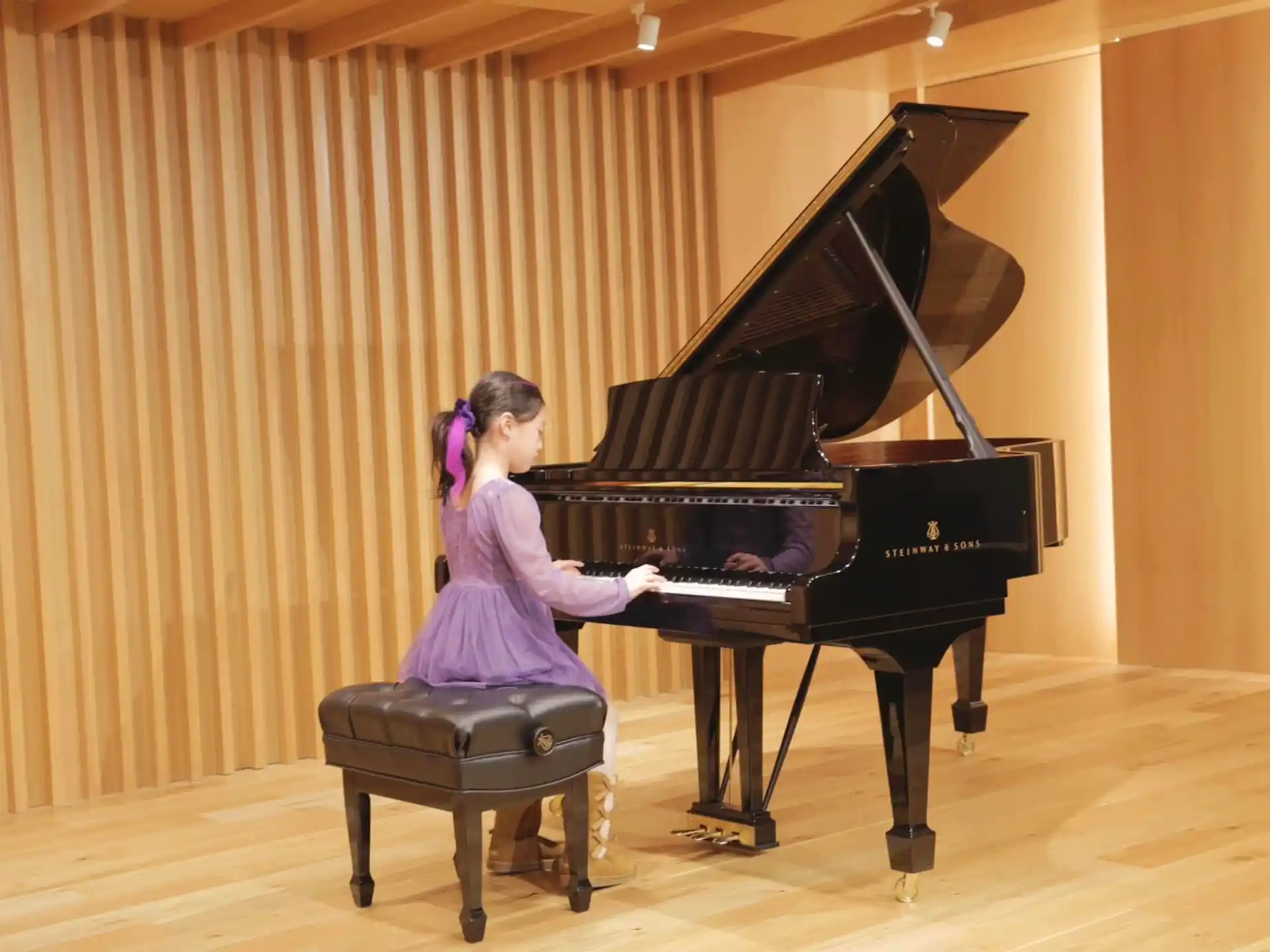 a person playing a piano