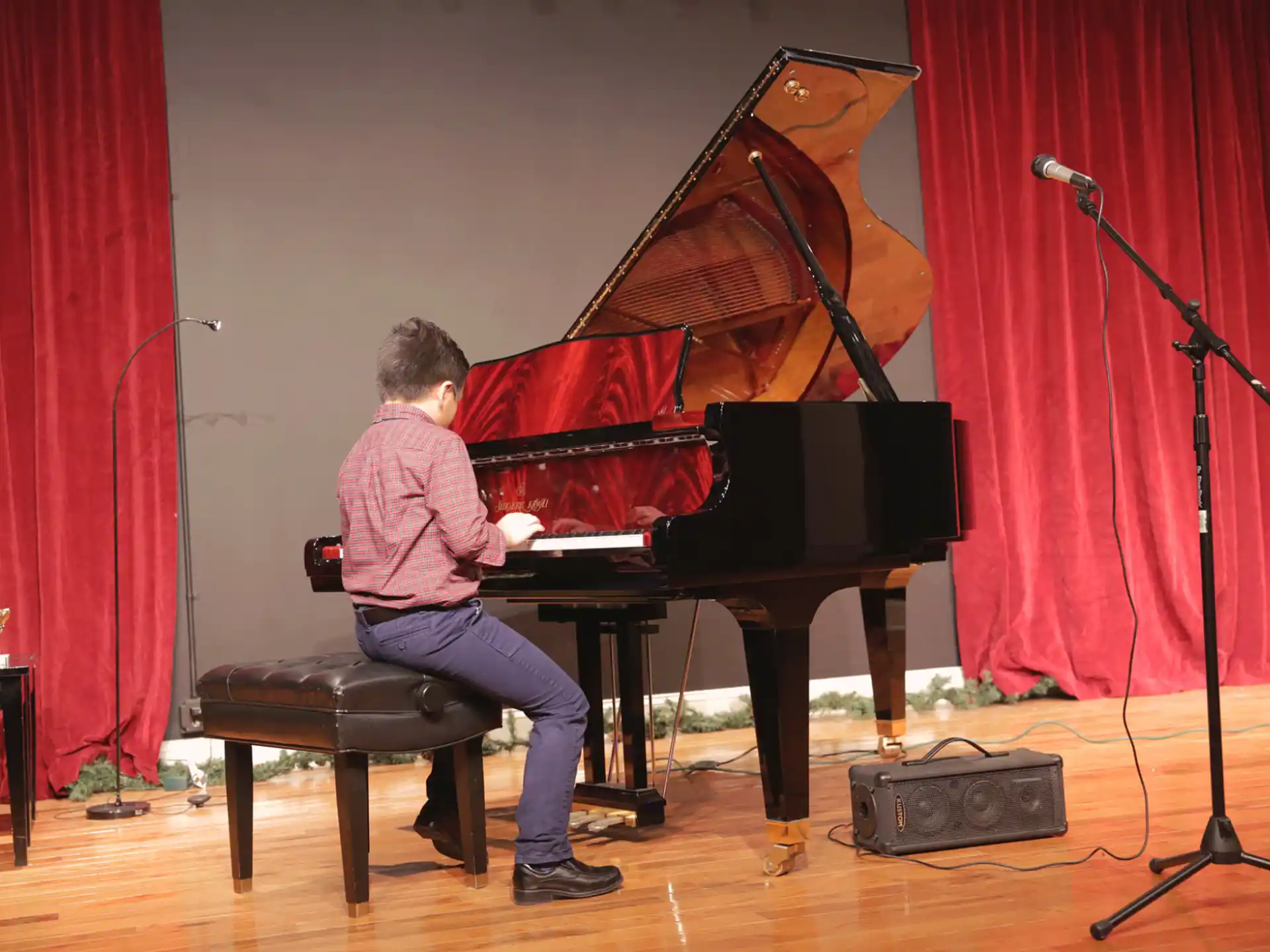 a person playing a piano