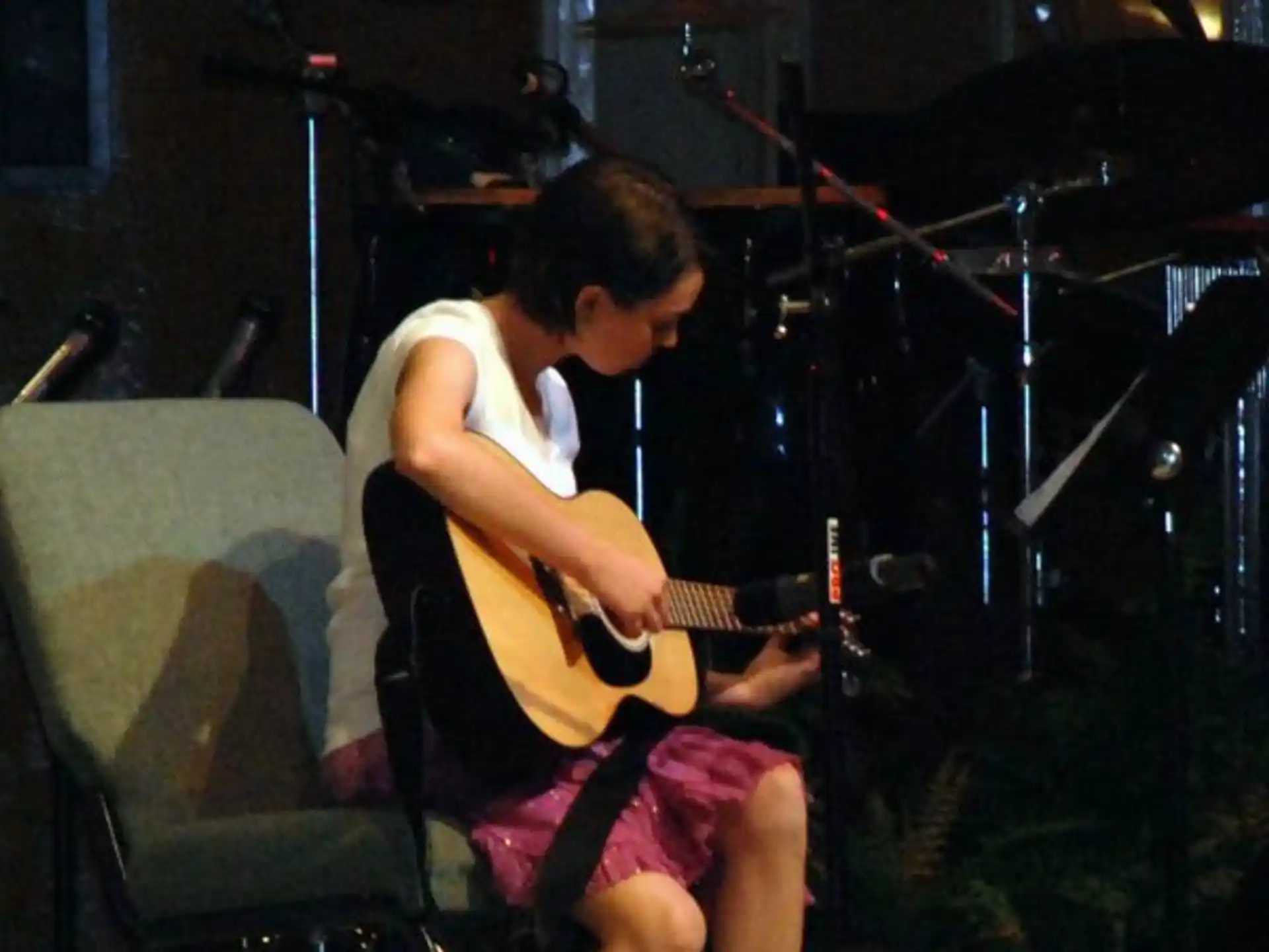 a man playing a guitar
