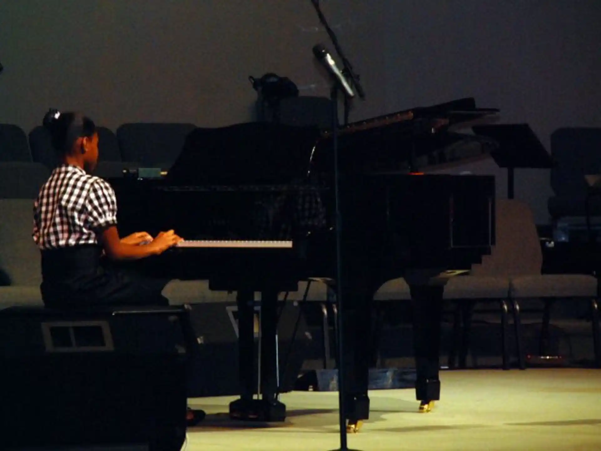 a man playing a piano