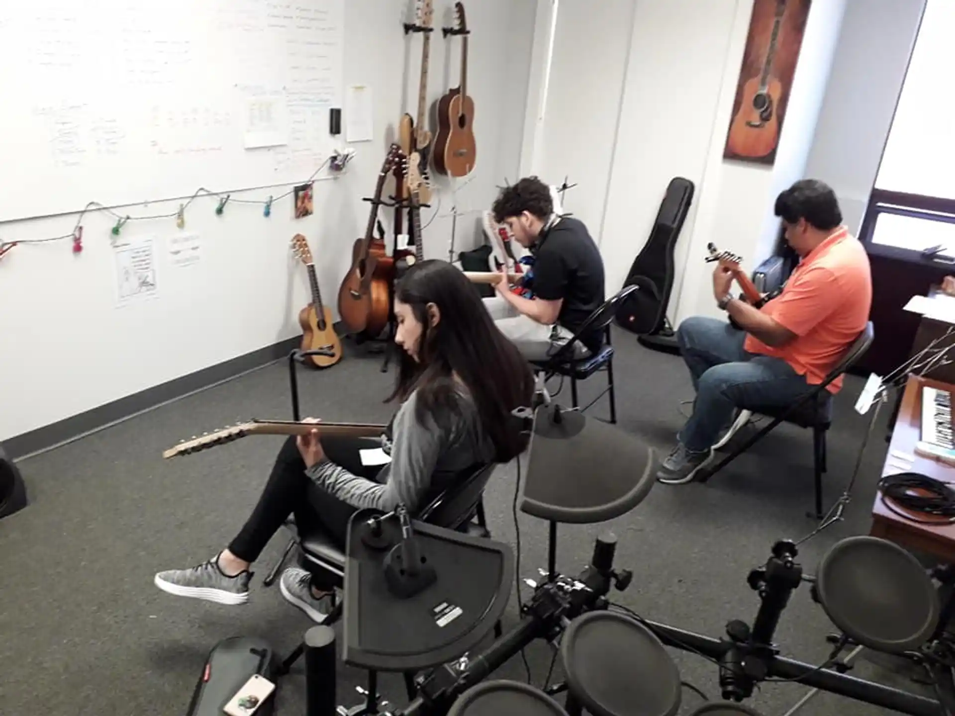 a group of people playing instruments