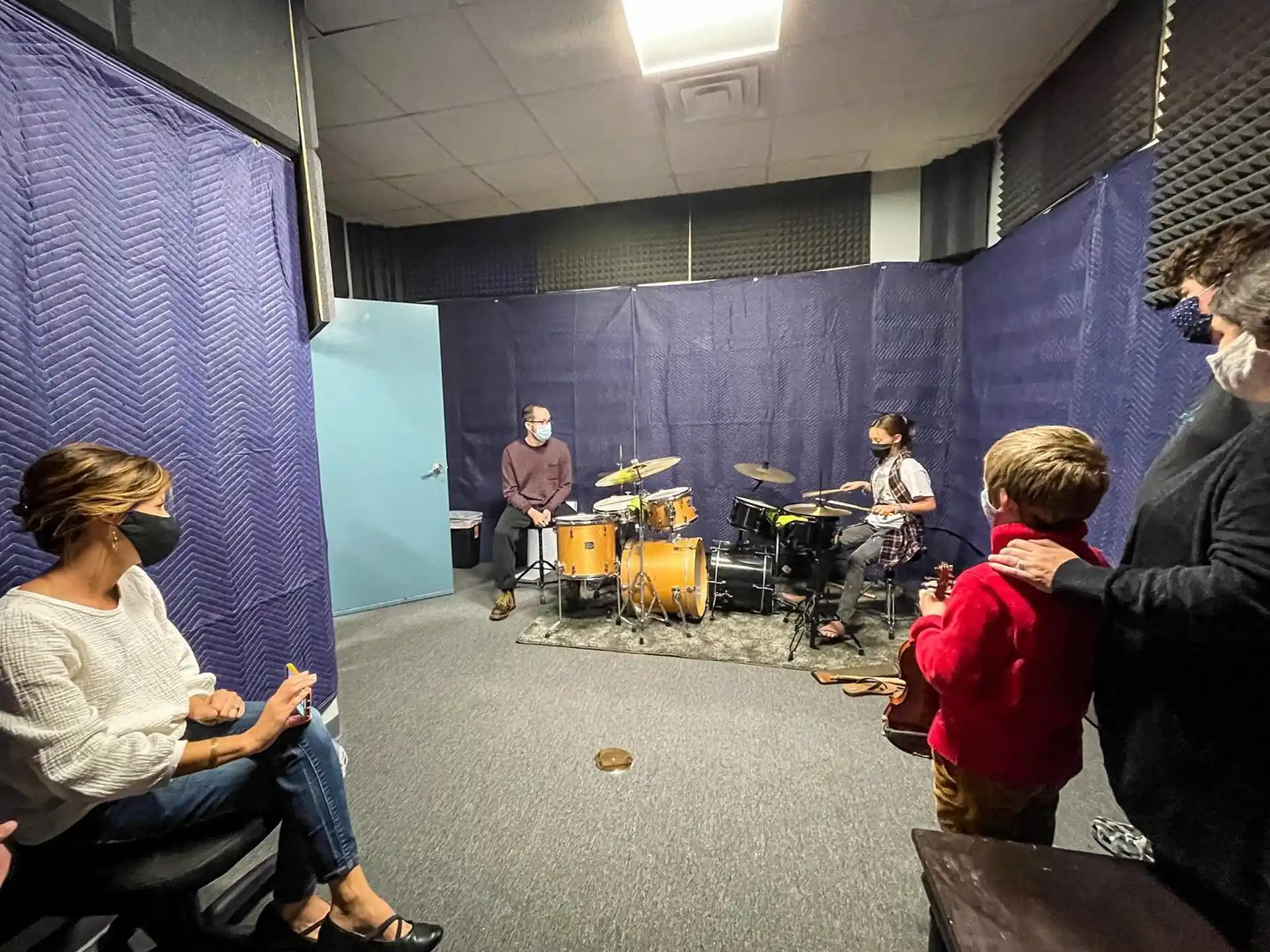 a group of people playing instruments