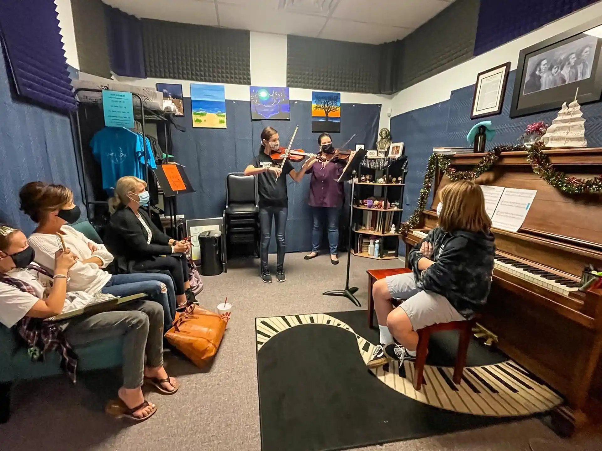 a group of people playing instruments