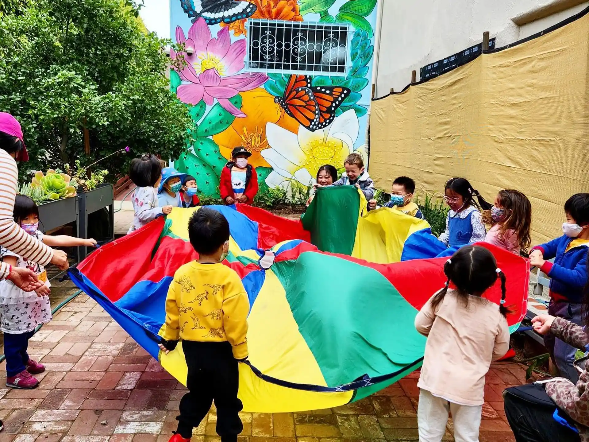 a group of children holding a flag
