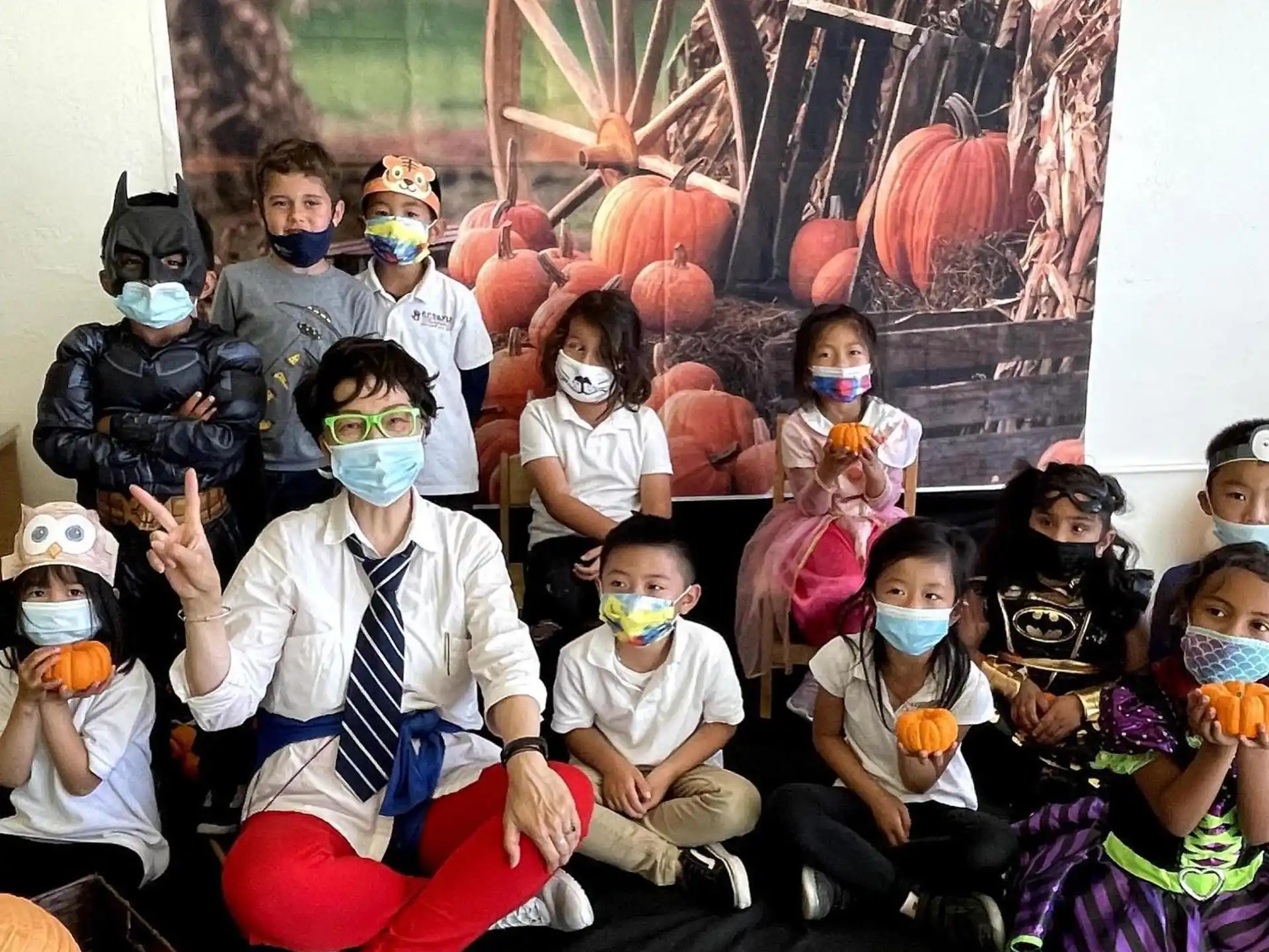 a group of people wearing masks