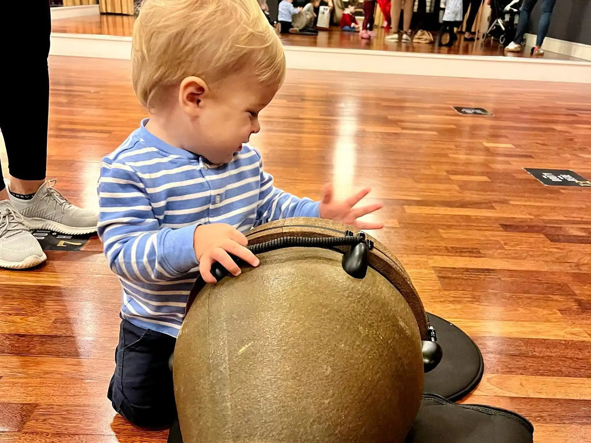 a baby playing with a toy