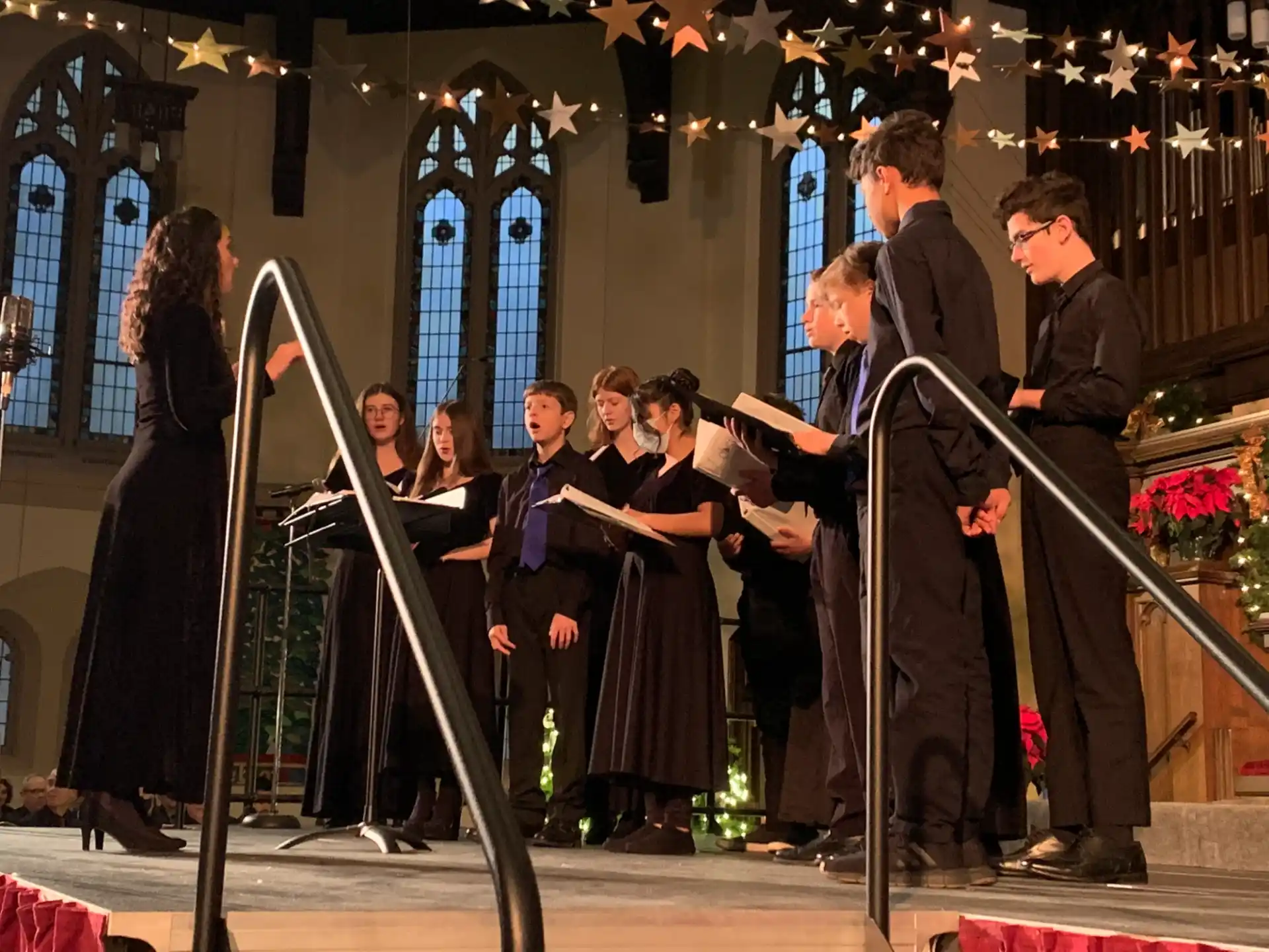 a group of people performing on stage