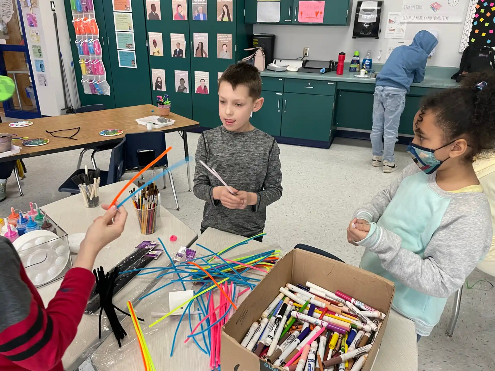a group of children playing a board game