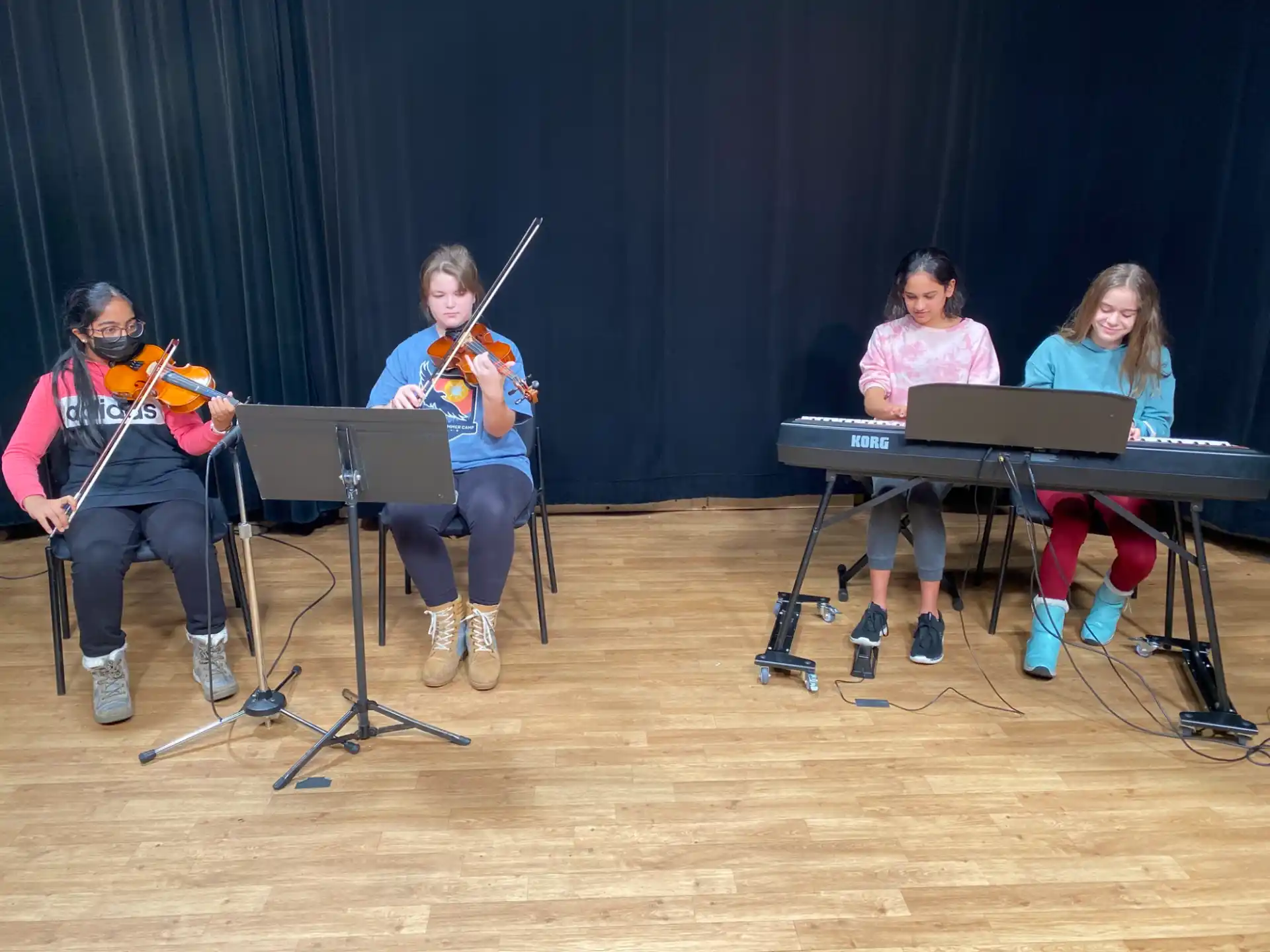 a group of people playing instruments