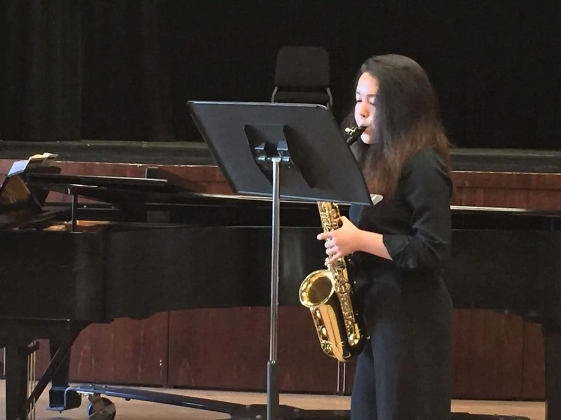a man playing a saxophone