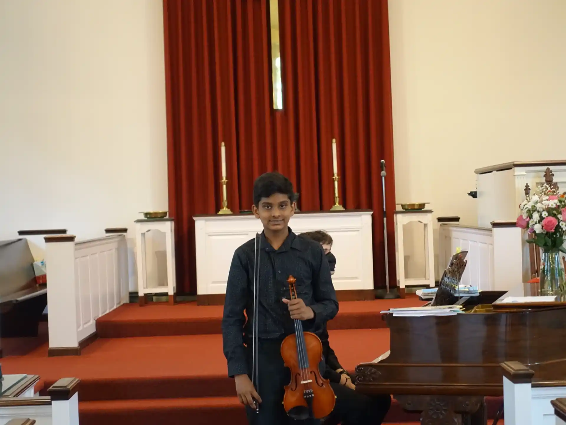 a man holding a guitar