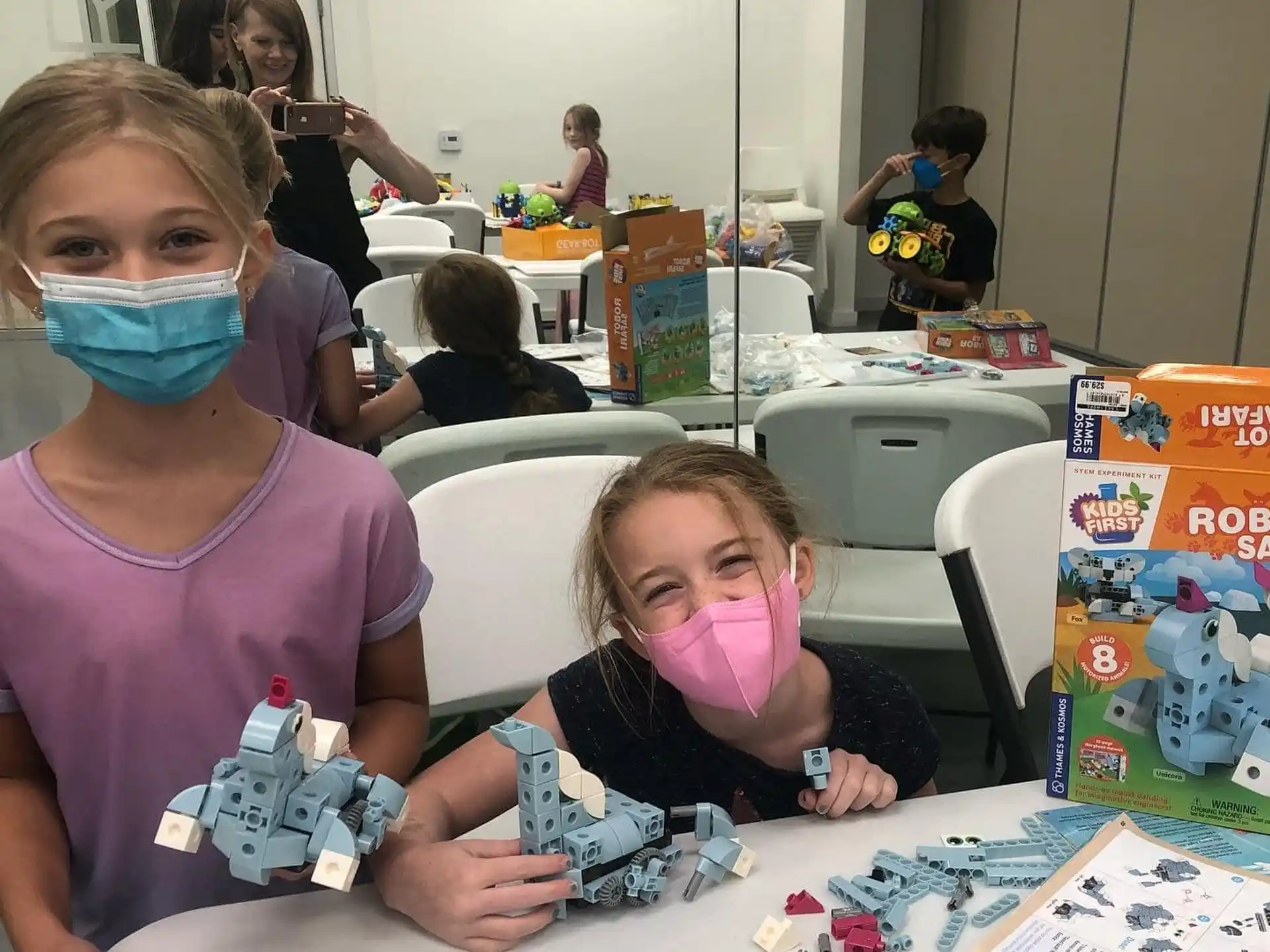 a group of children wearing face masks