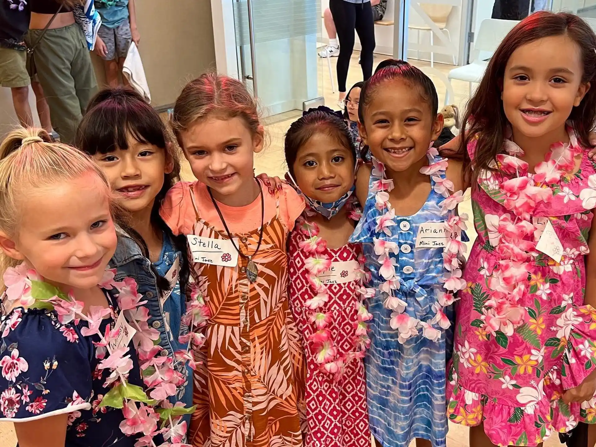 a group of girls posing for a photo