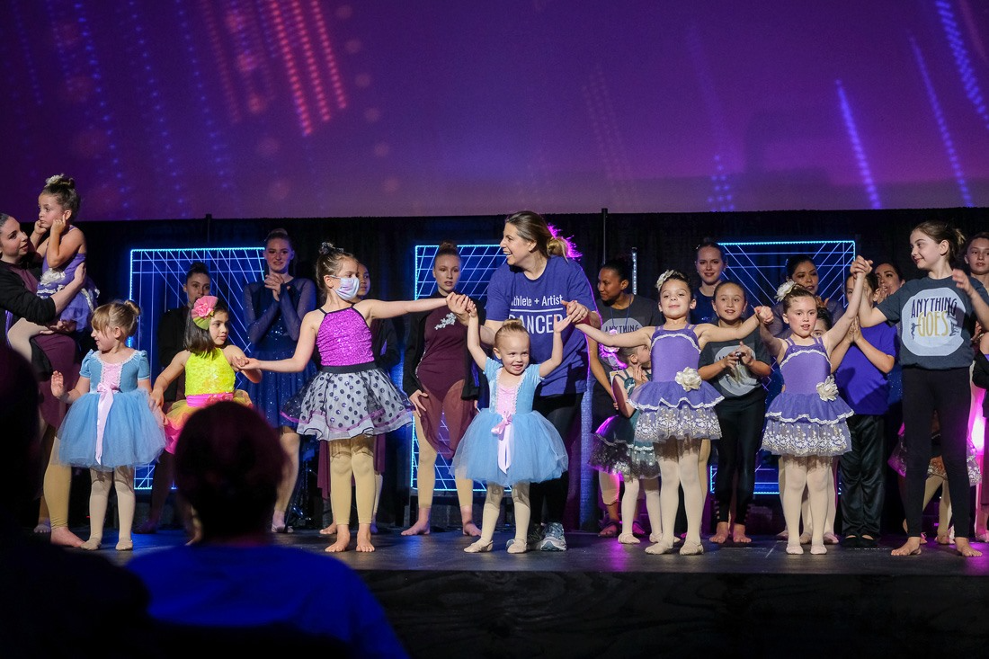 a group of people on a stage