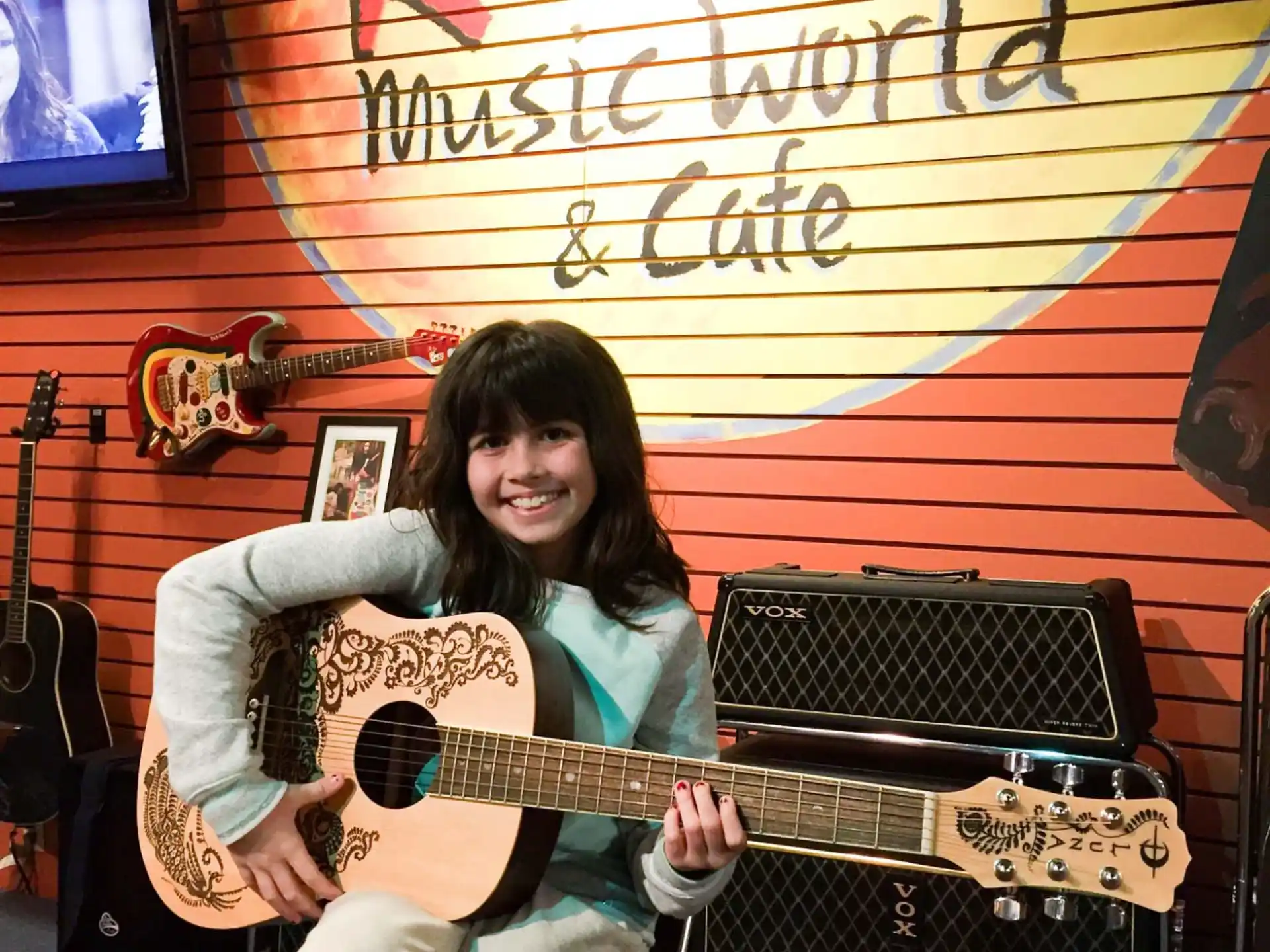 a person holding a guitar