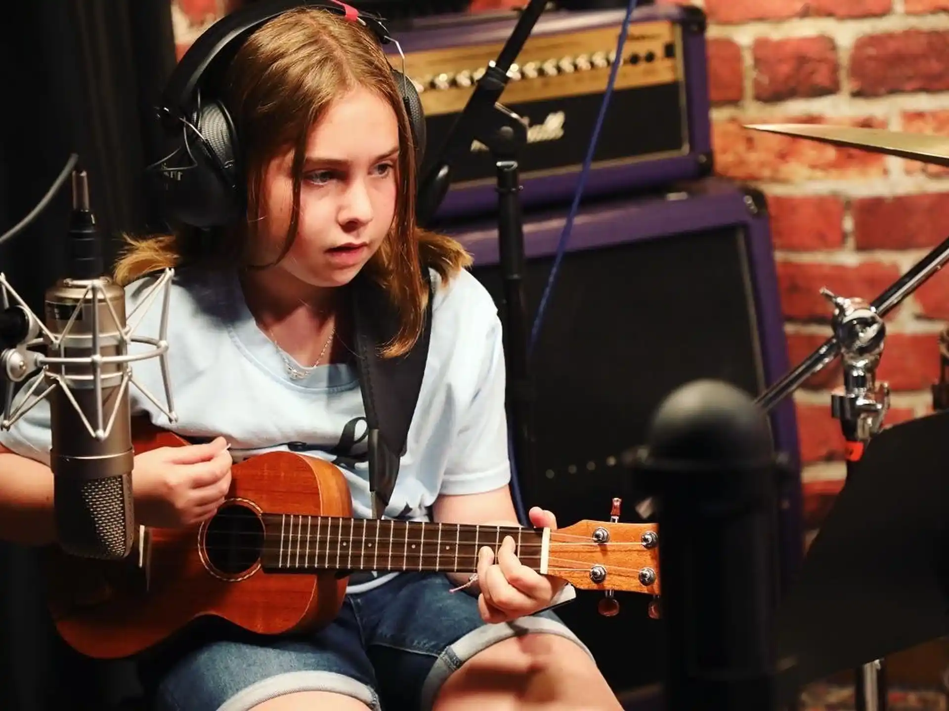 a person playing a guitar