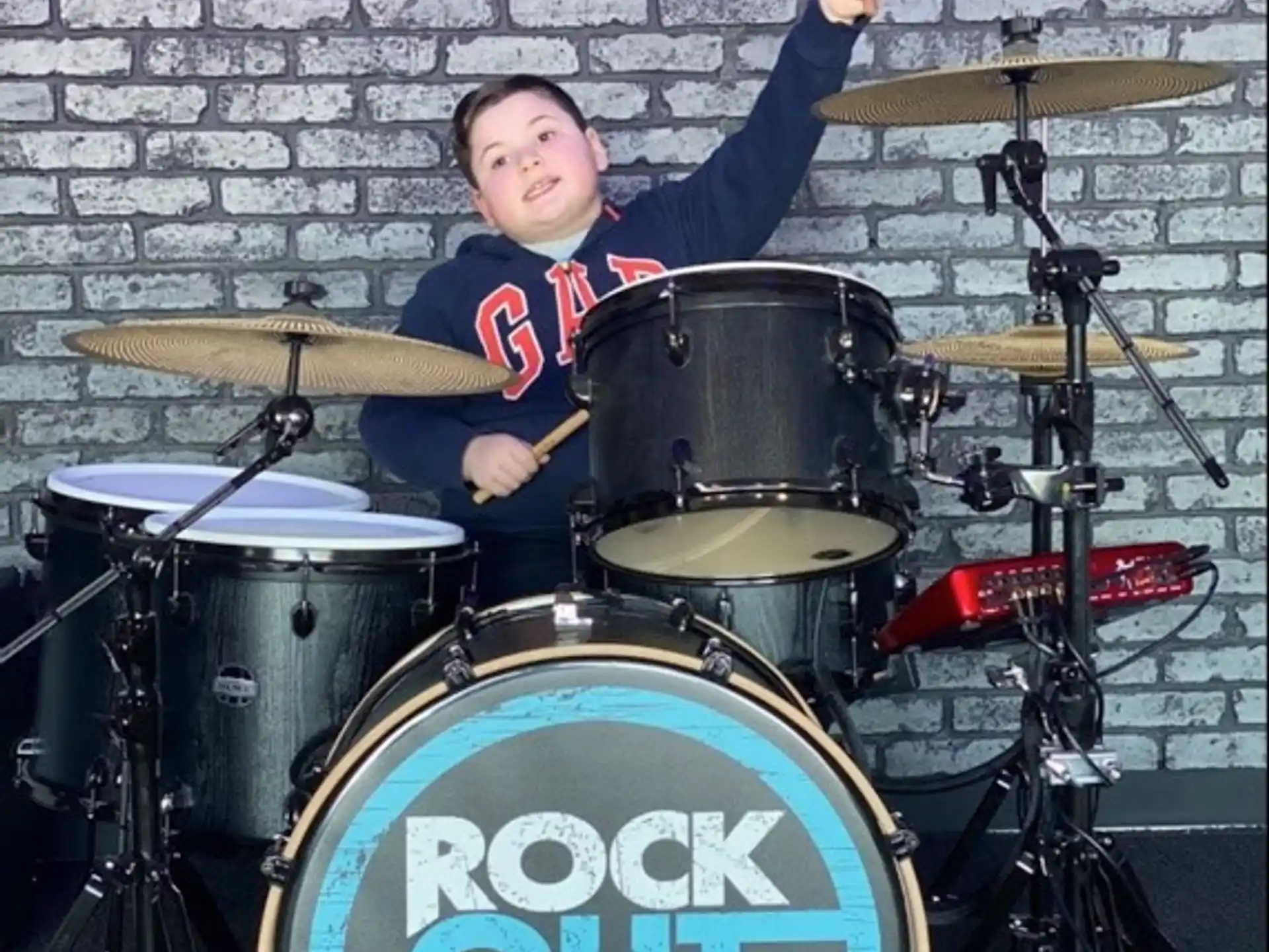 a man playing drums