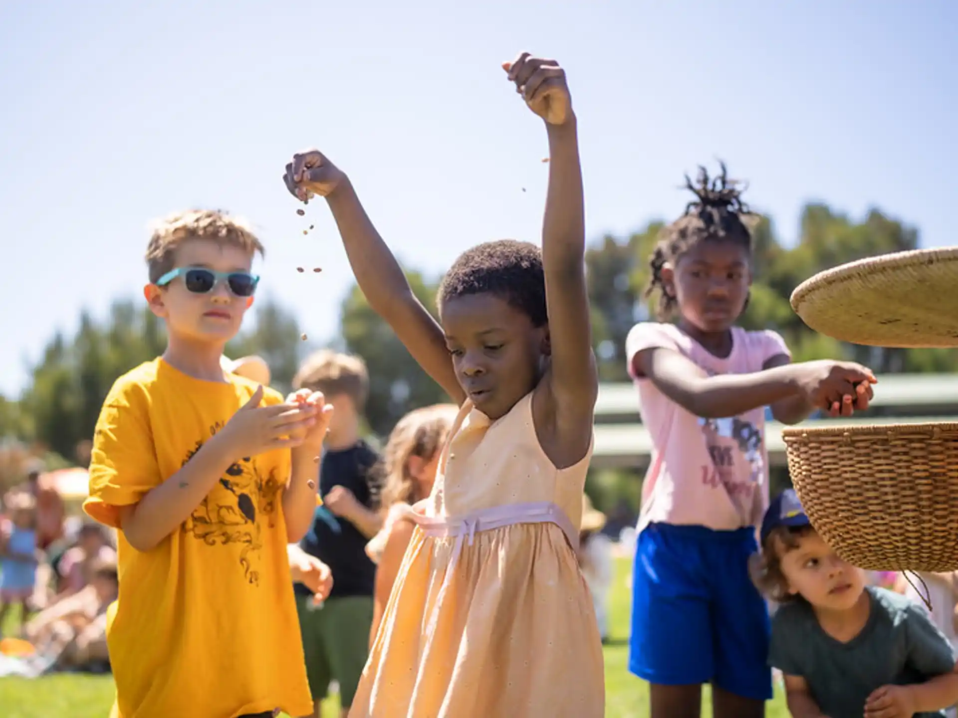 a group of children holding baskets