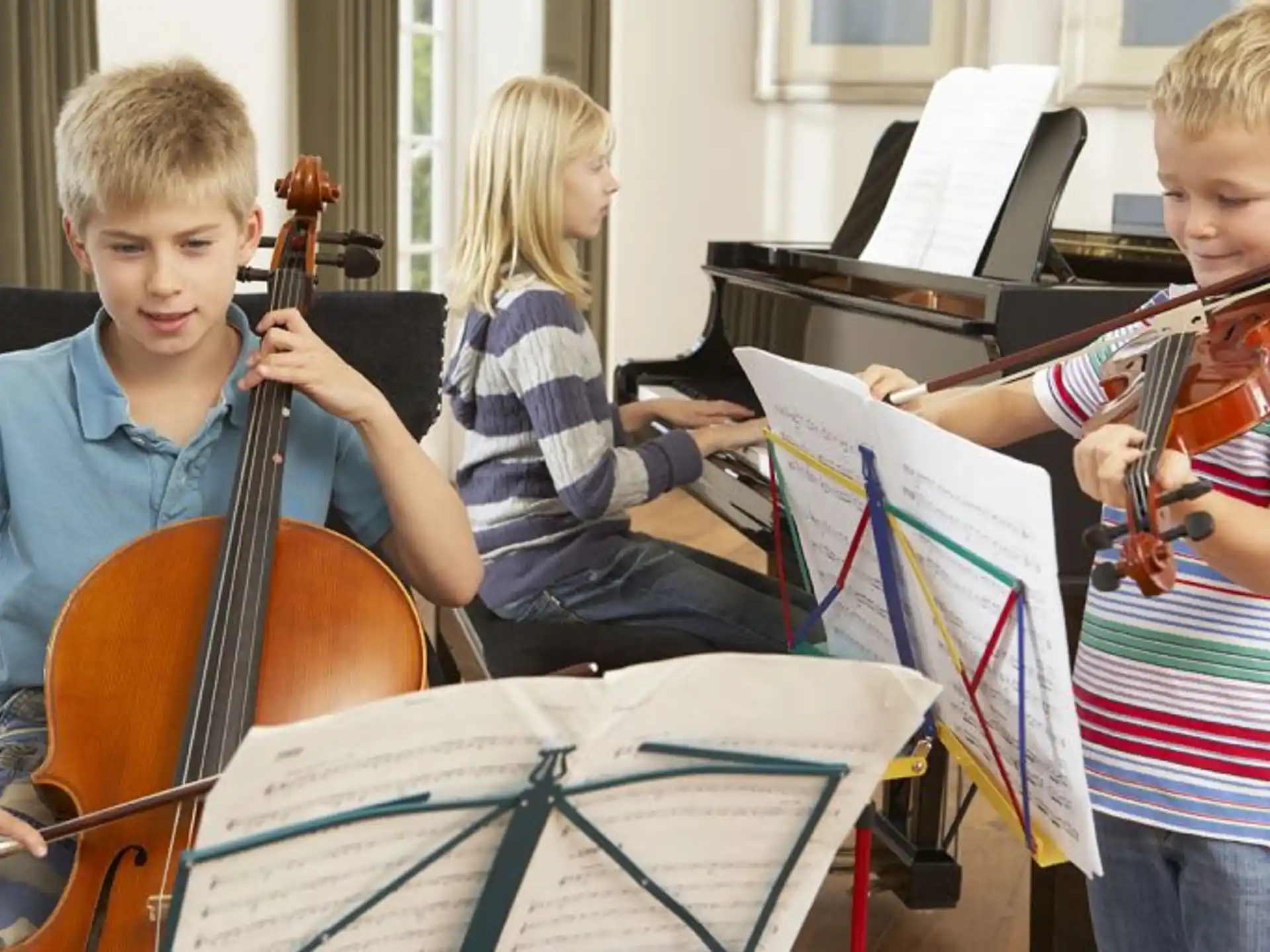 a group of kids playing musical instruments