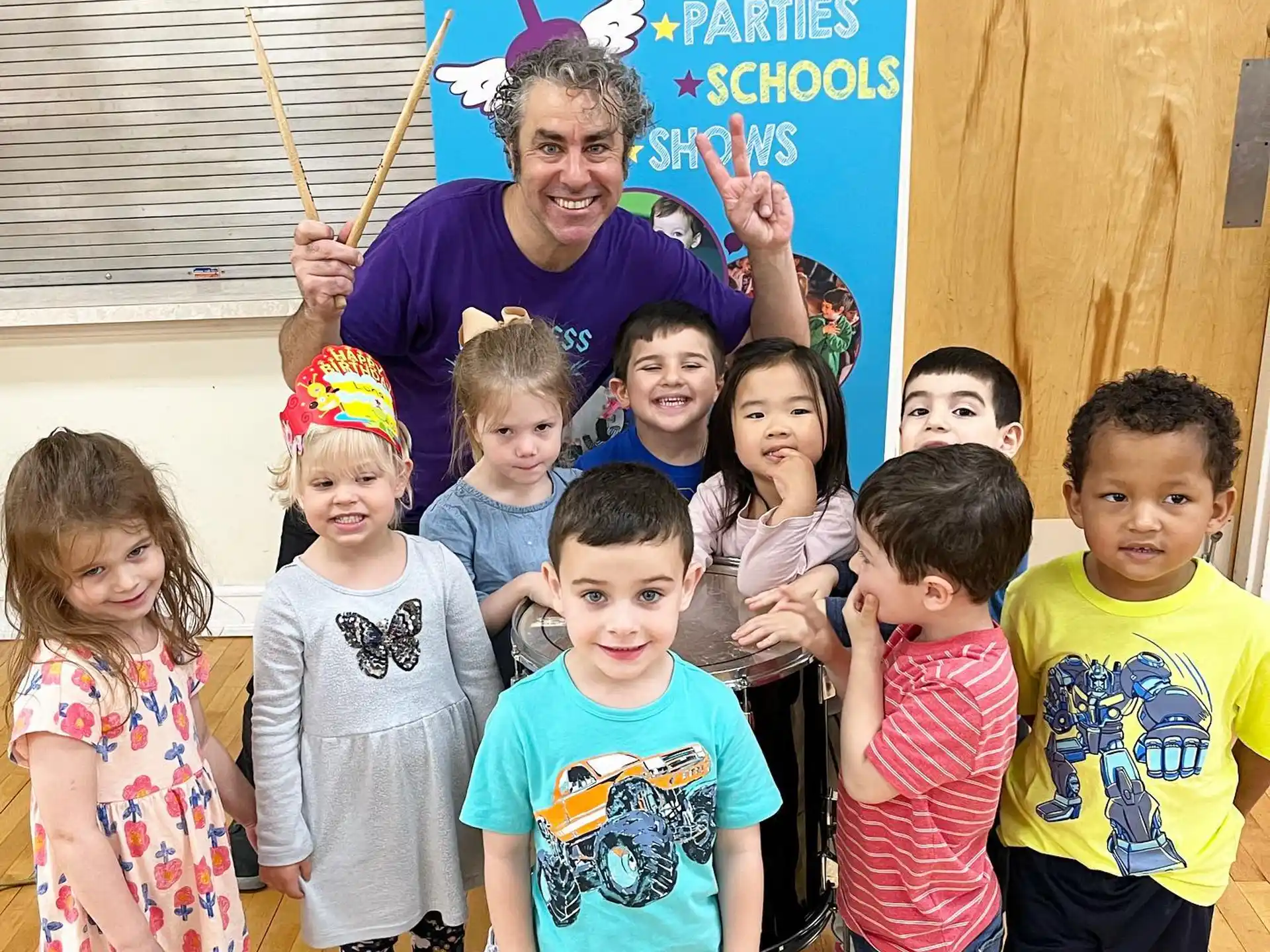 a group of children posing for a photo