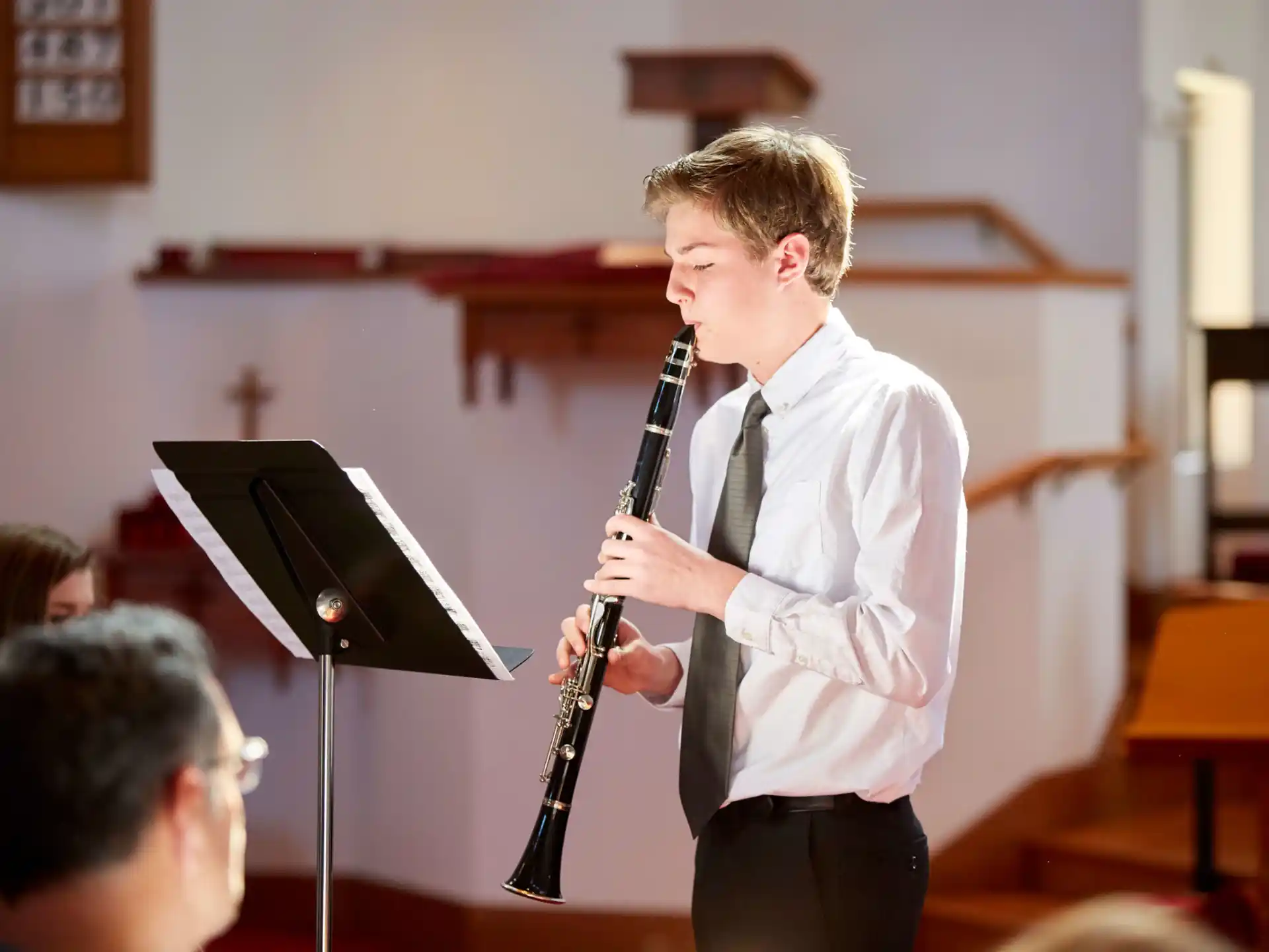 a man holding a musical instrument