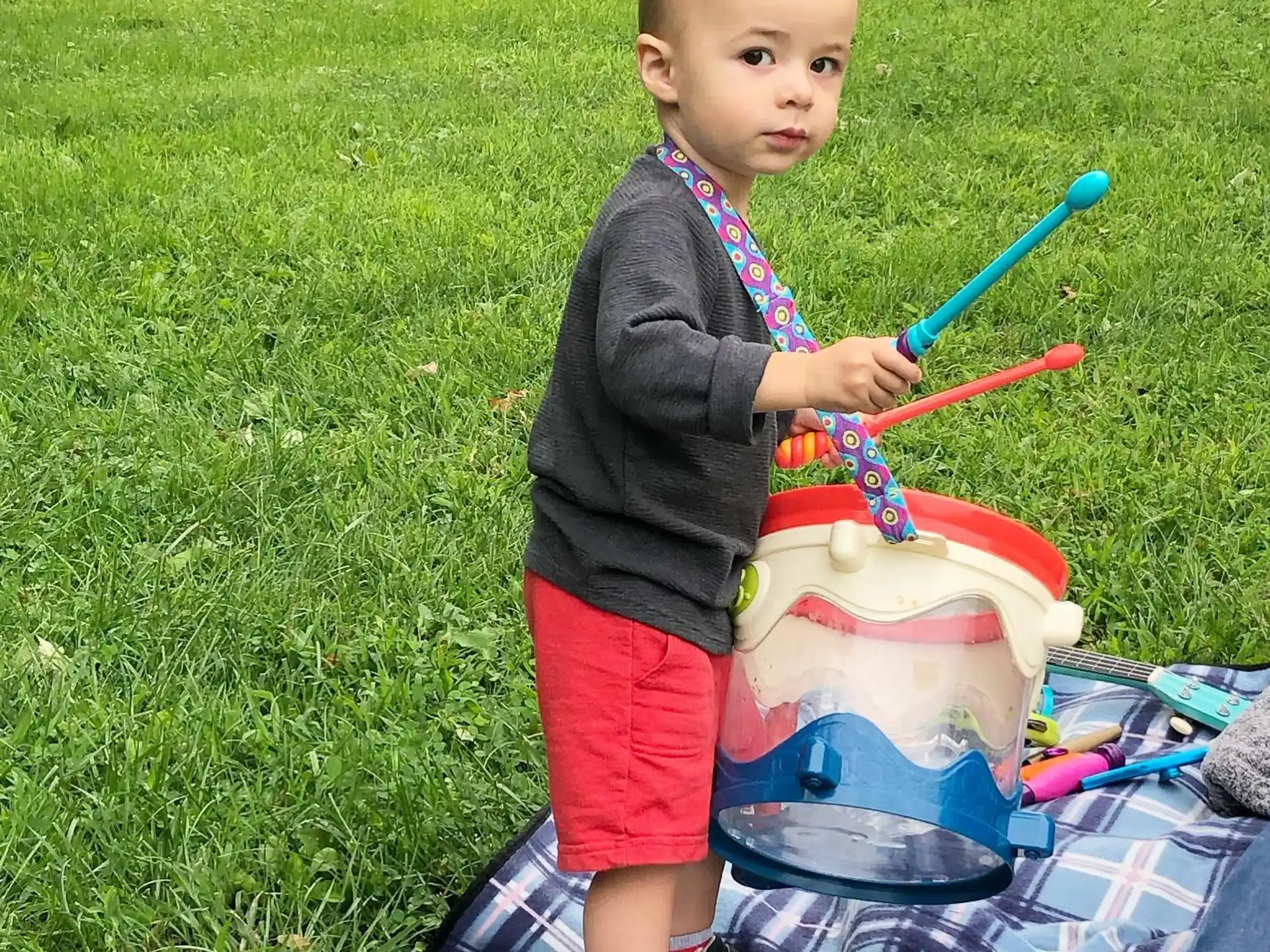 a baby holding a toy