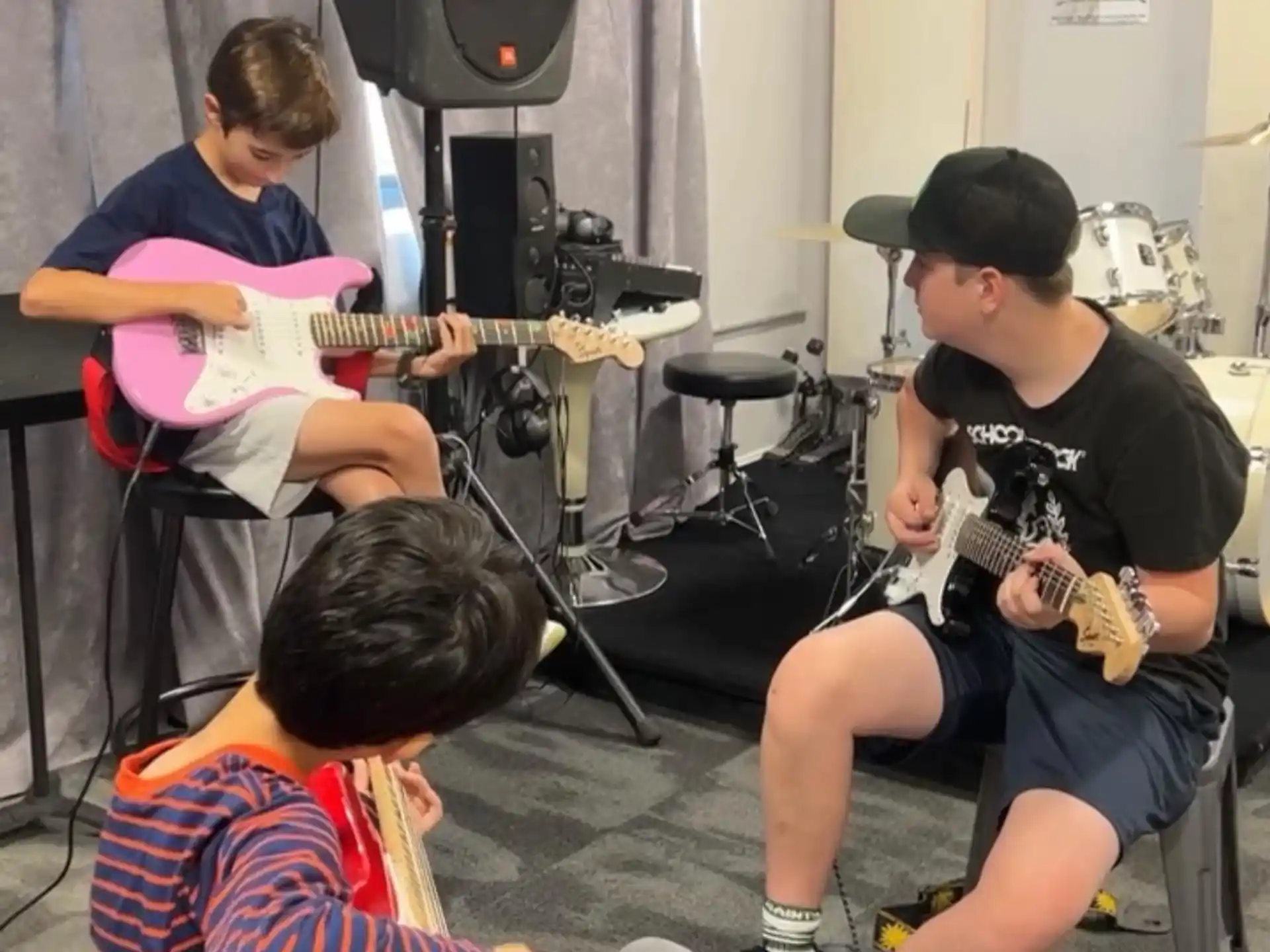 a group of people playing instruments
