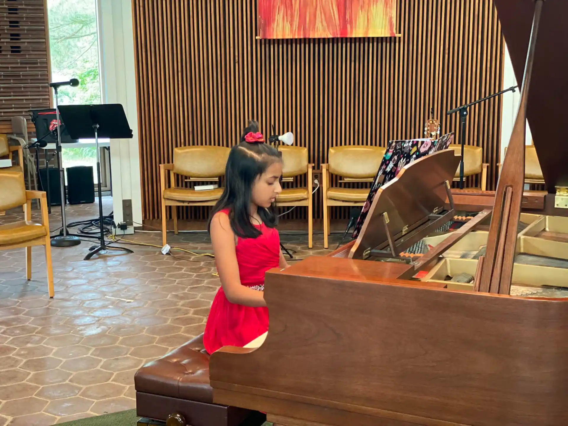 a girl playing the piano