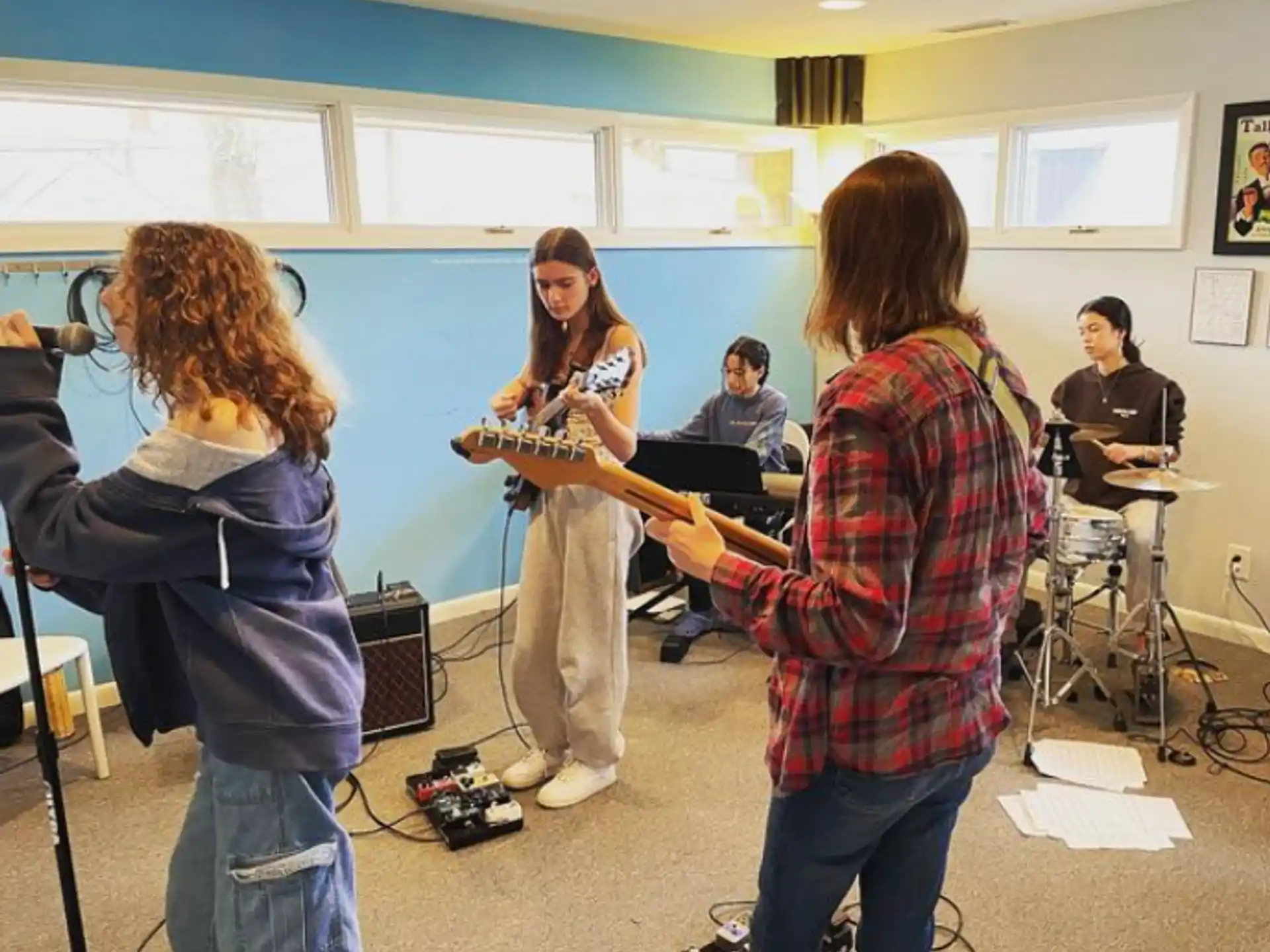 a group of people playing instruments