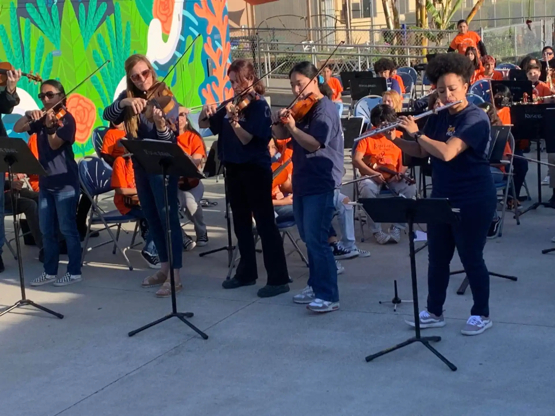 a group of people playing instruments