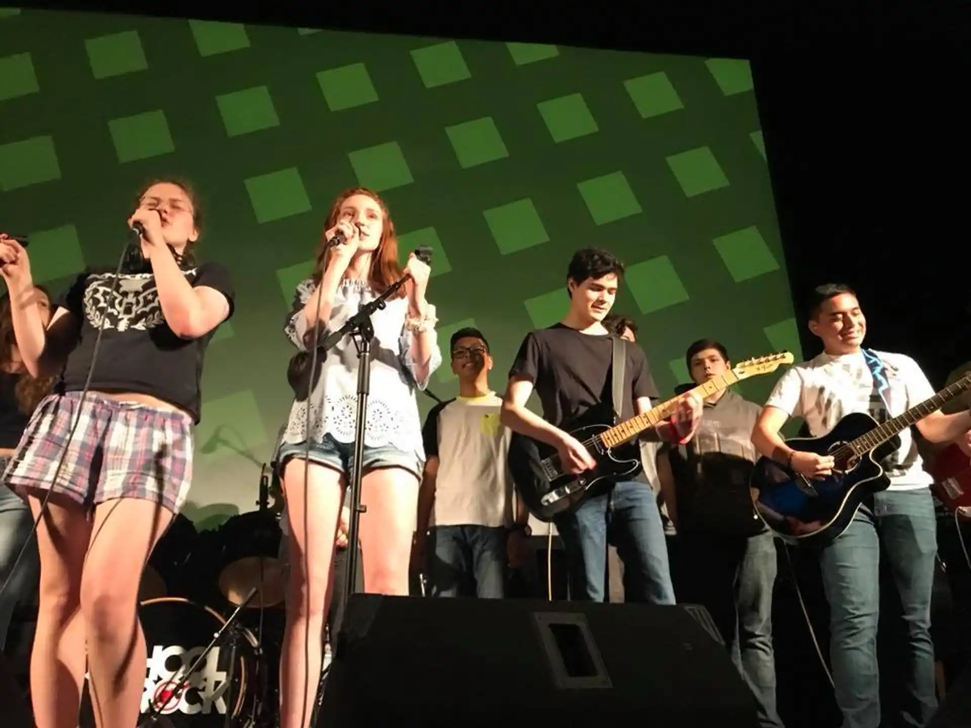 a group of people on a stage