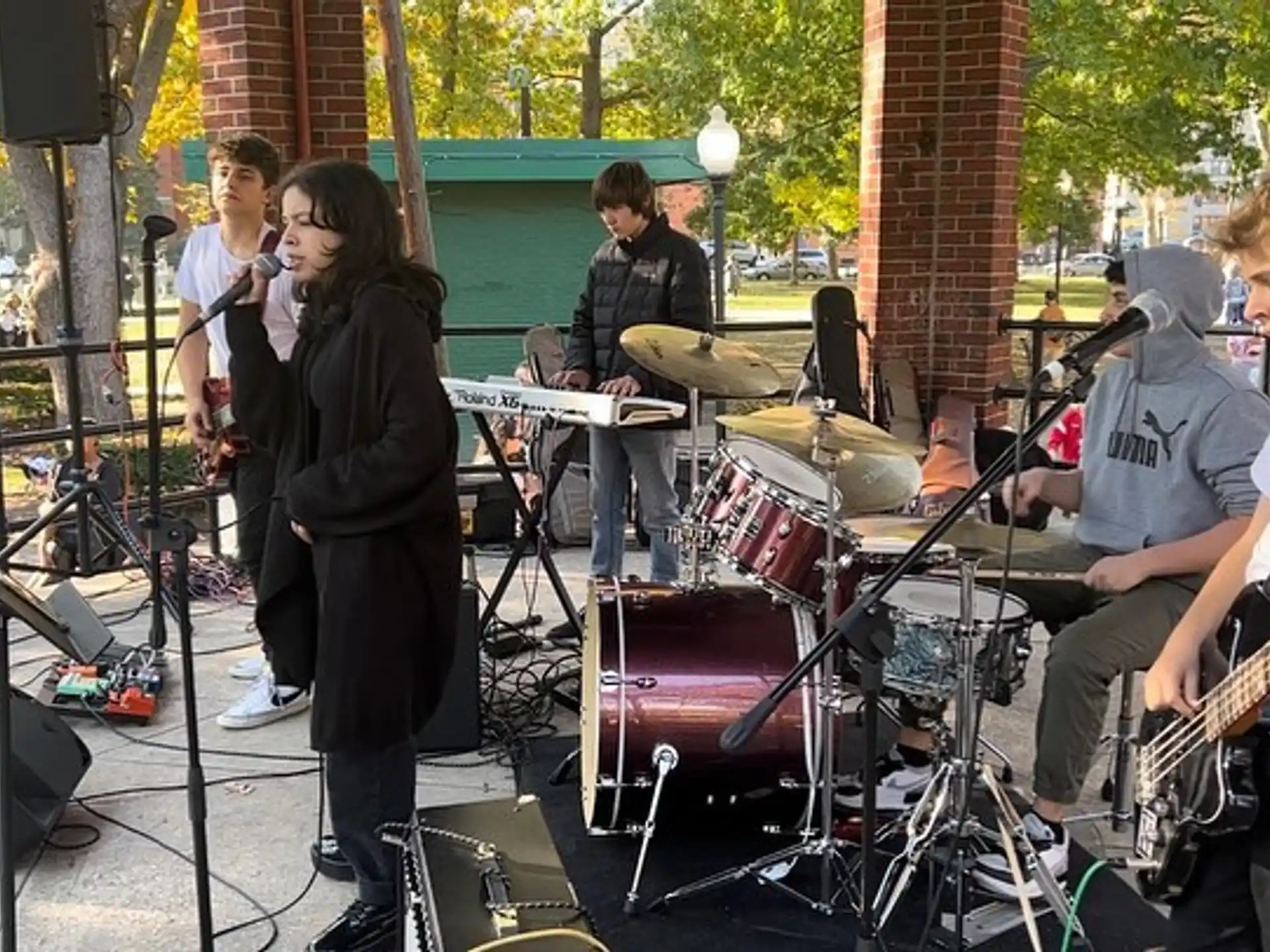 a group of people playing instruments