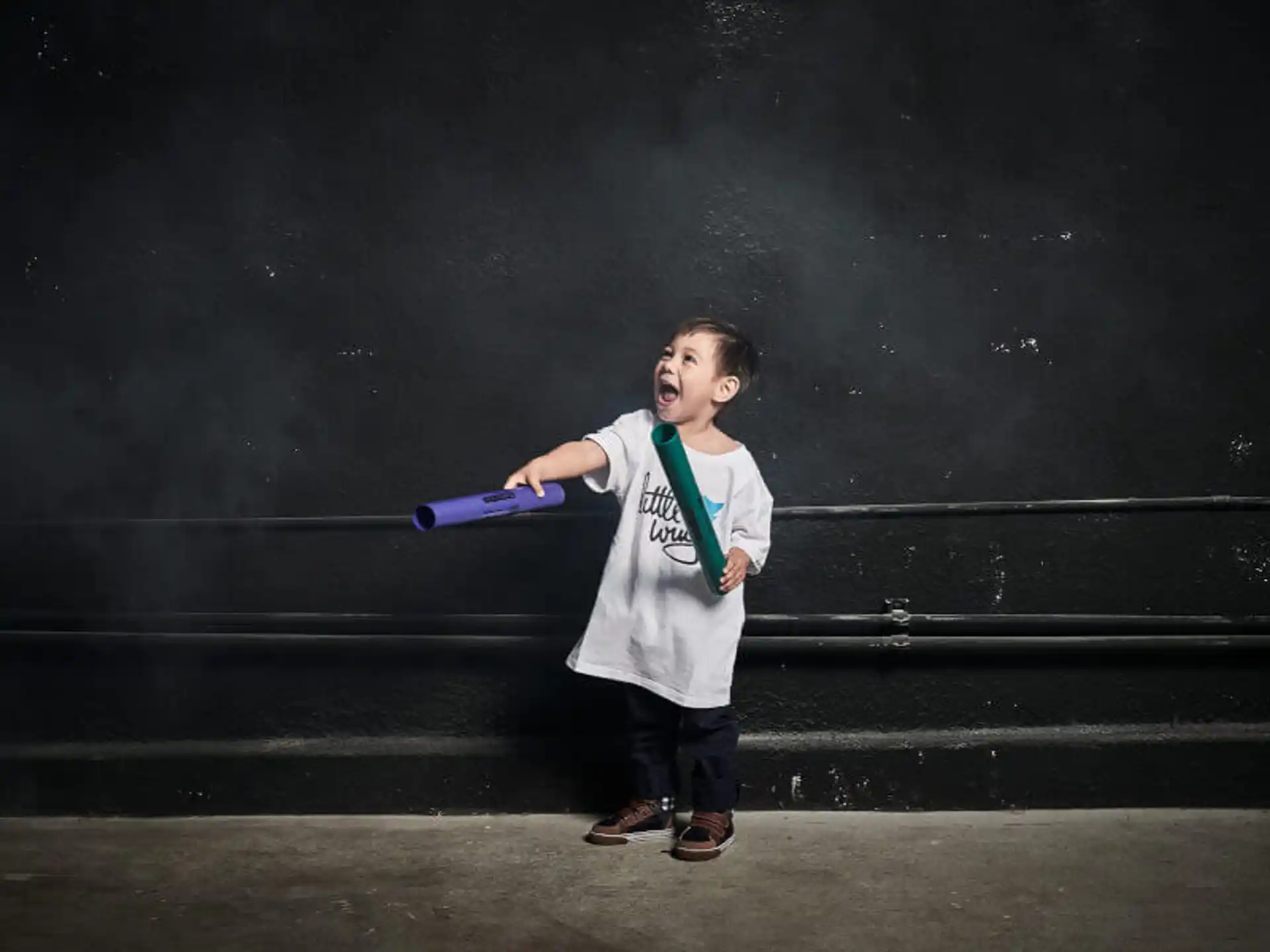 a boy holding a bat