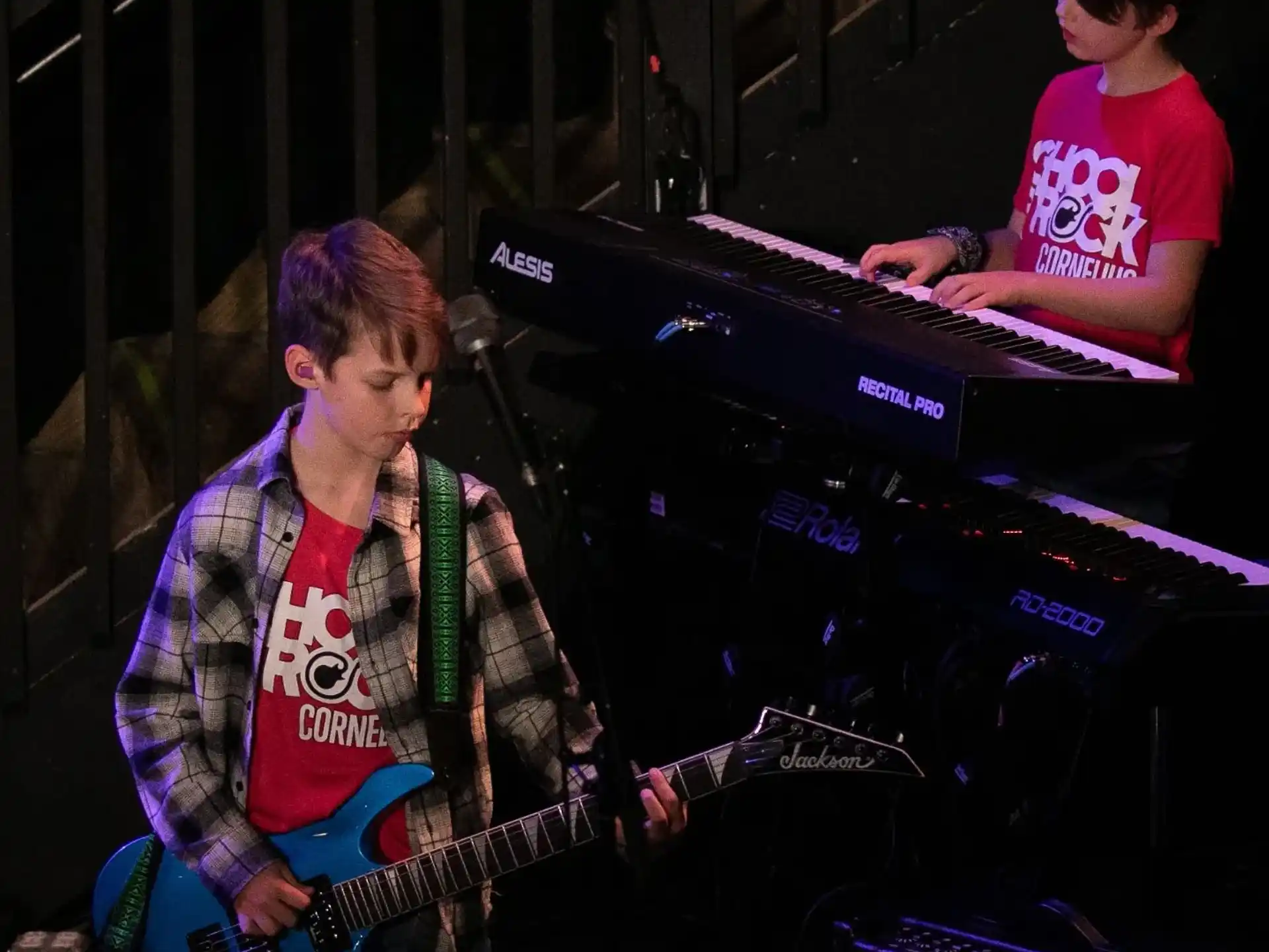 a couple of men playing musical instruments