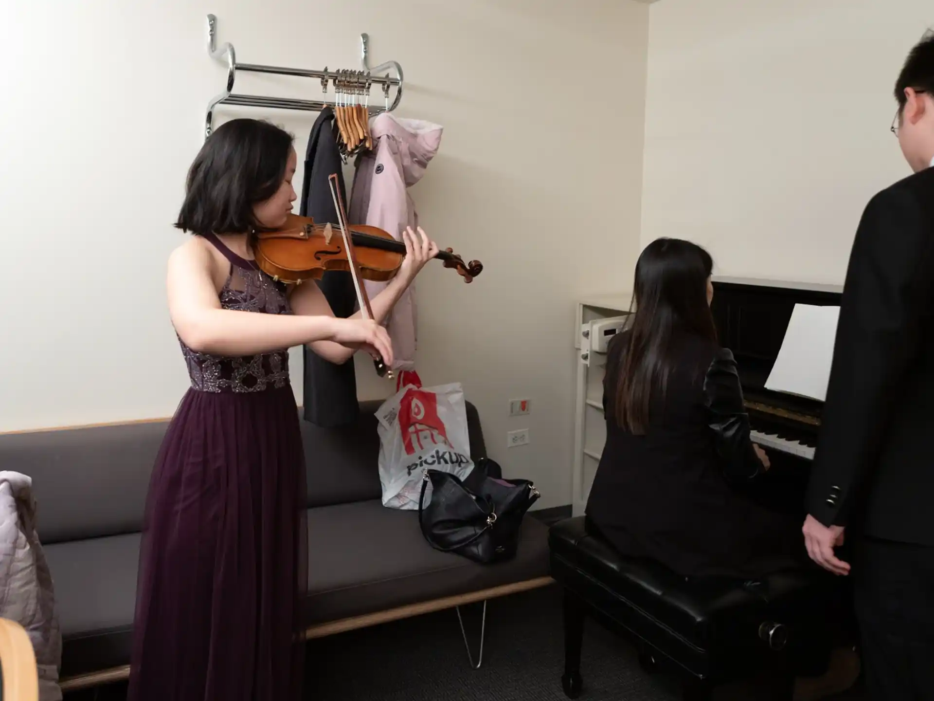 a person playing a violin