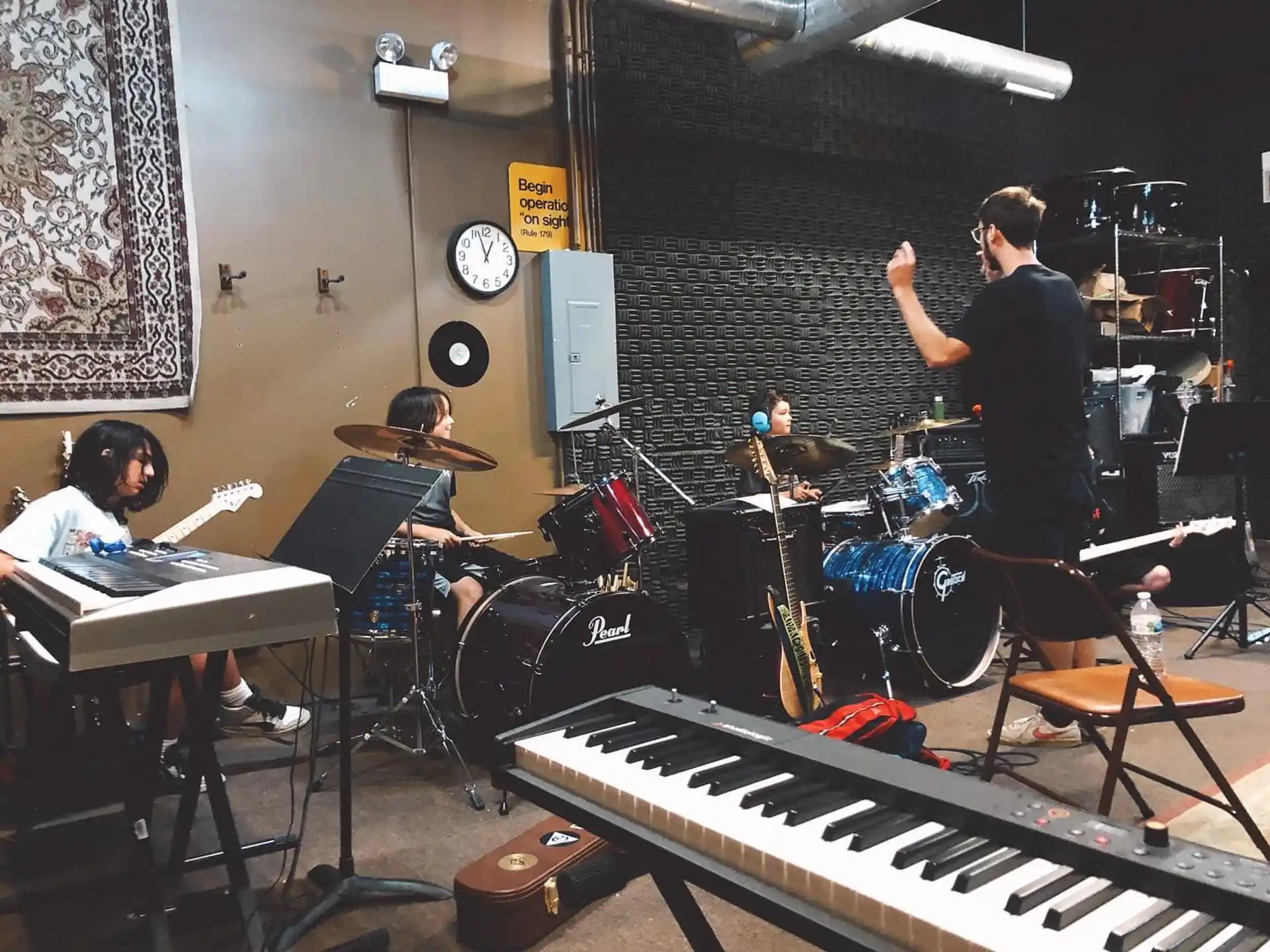 a group of people playing instruments