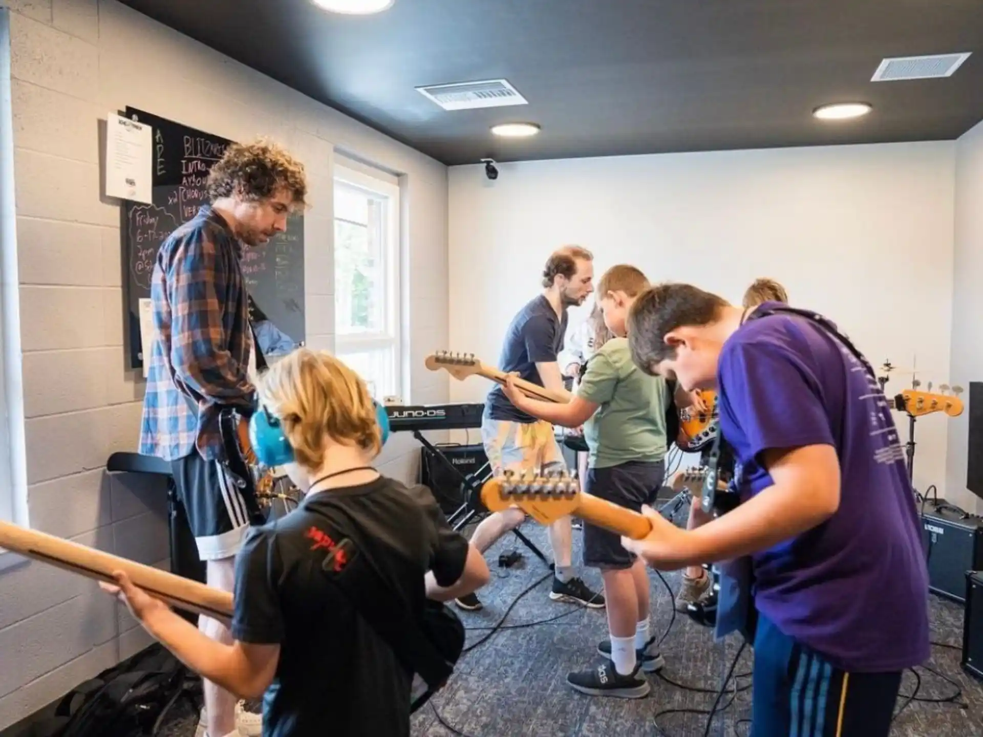 a group of people playing instruments
