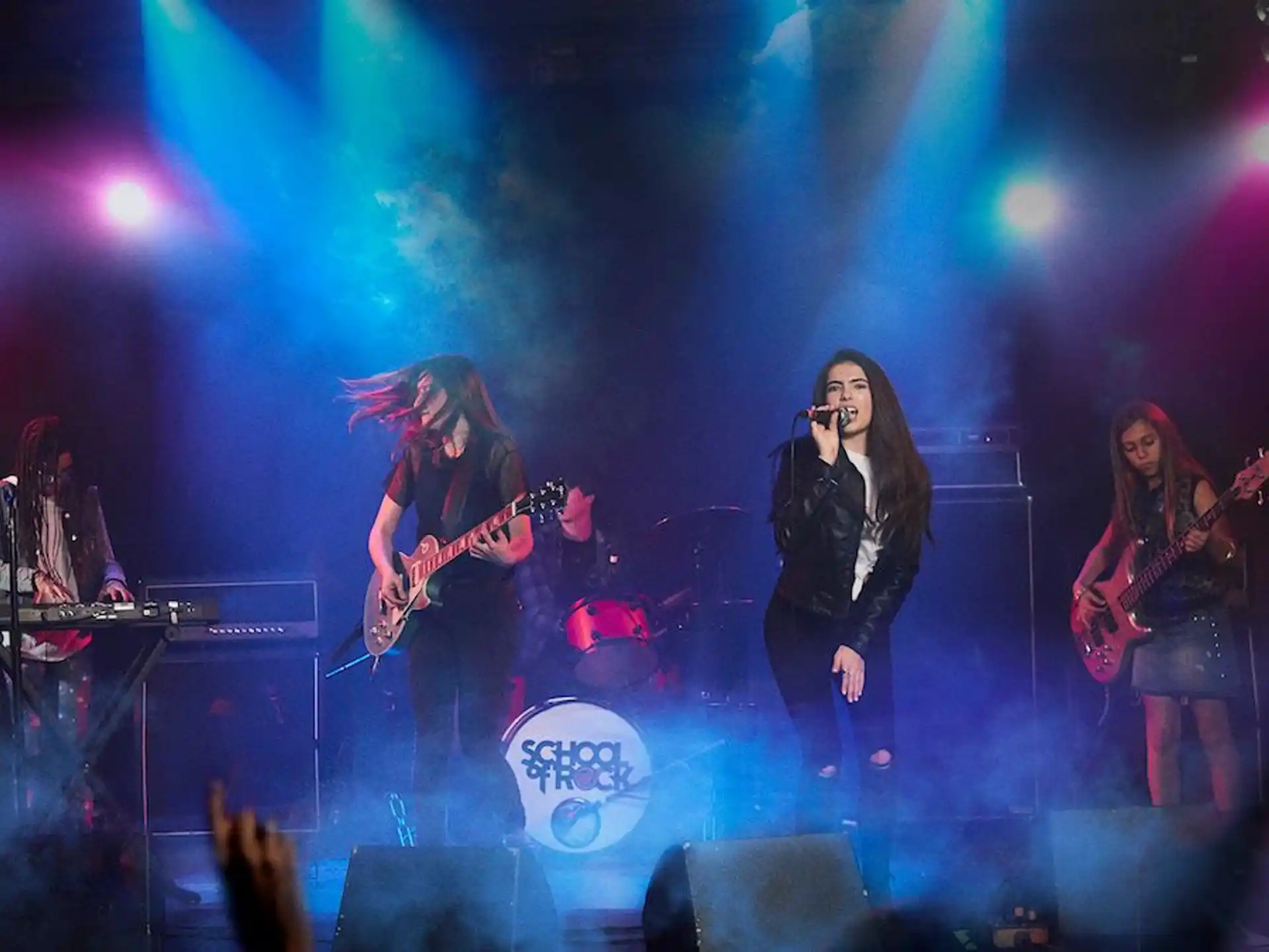 a group of women on a stage