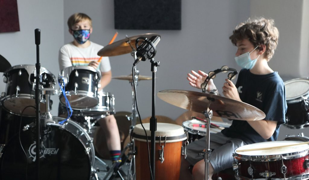 a group of people playing instruments