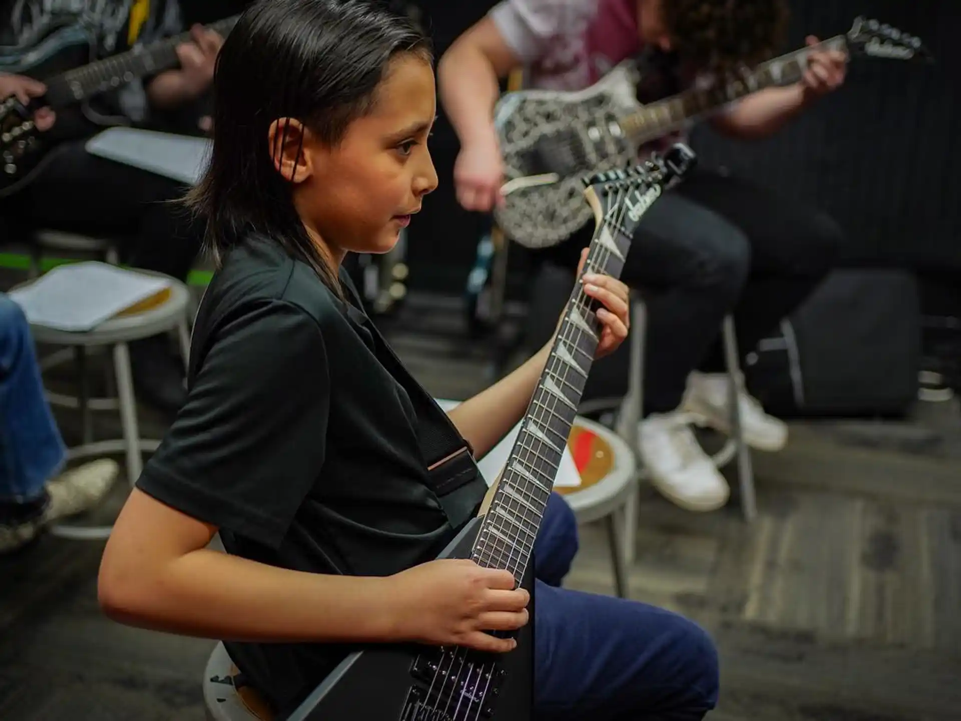 a man playing a guitar